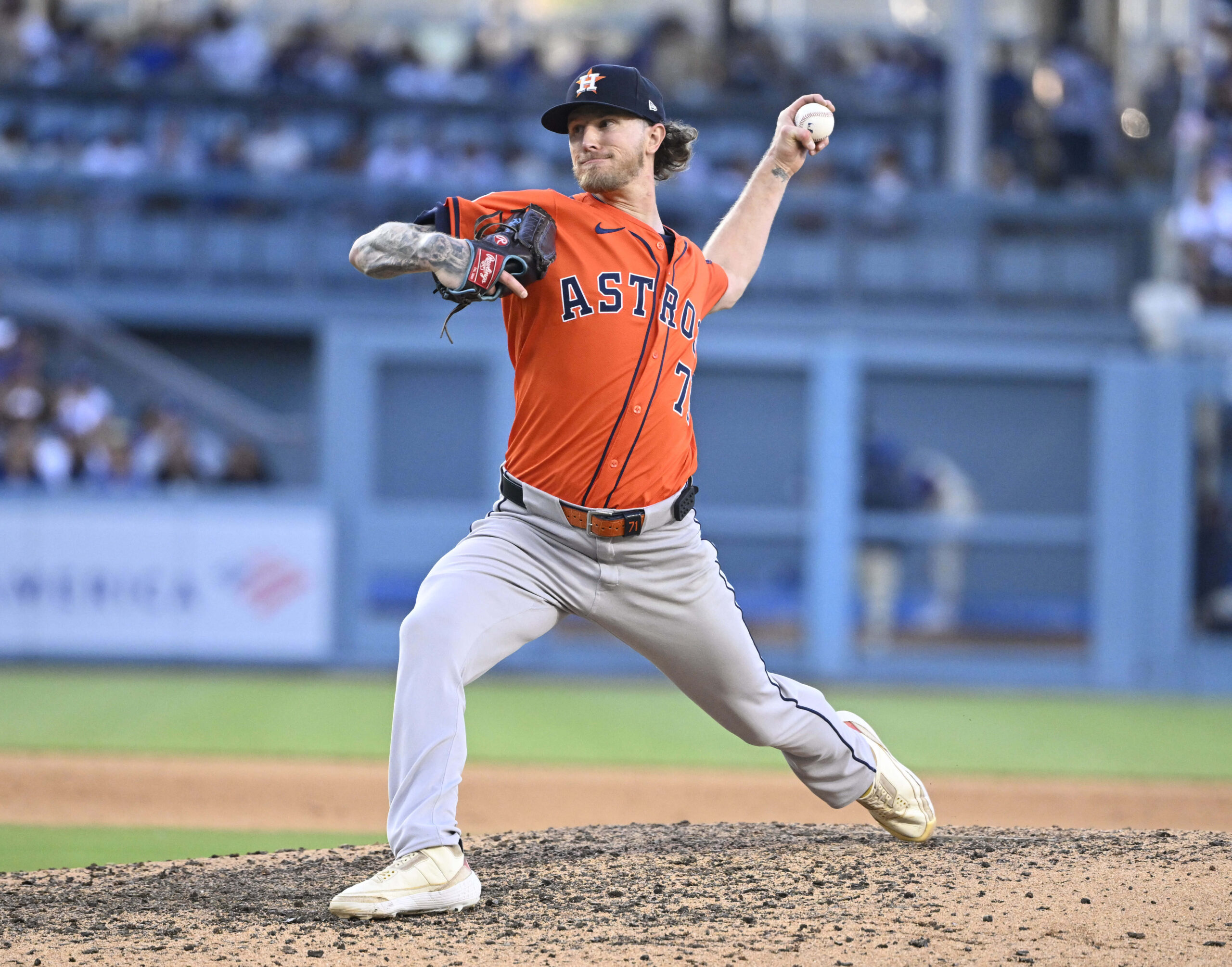 Josh Hader #71 of the Houston Astros throws to the...