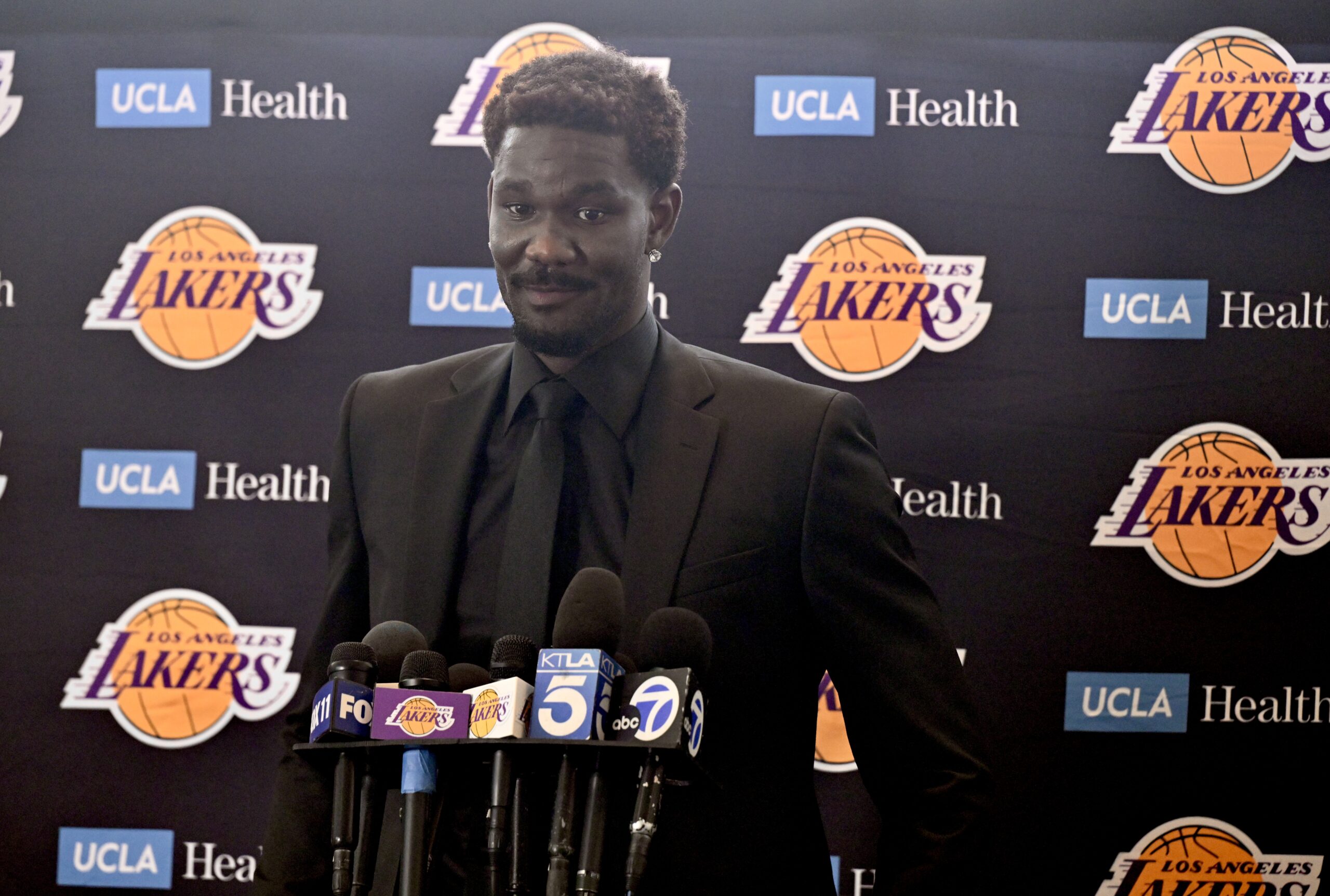 New Lakers center Deandre Ayton speaks to reporters during an...