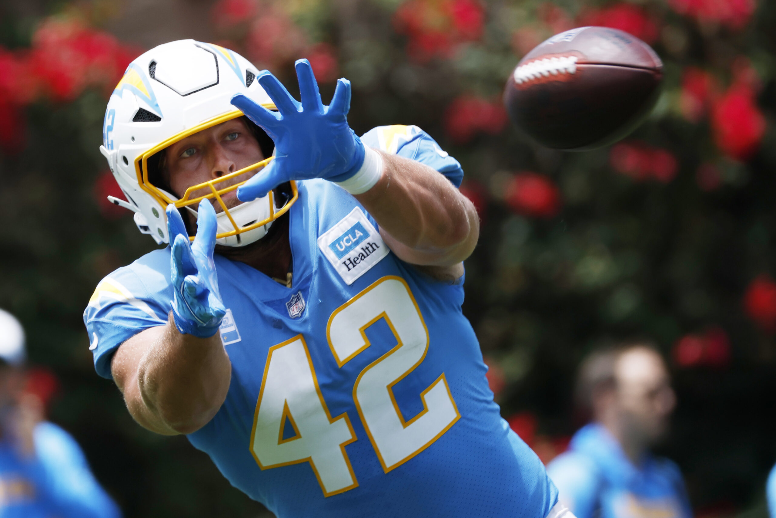 Chargers tight end Tucker Fisk catches a pass during a...