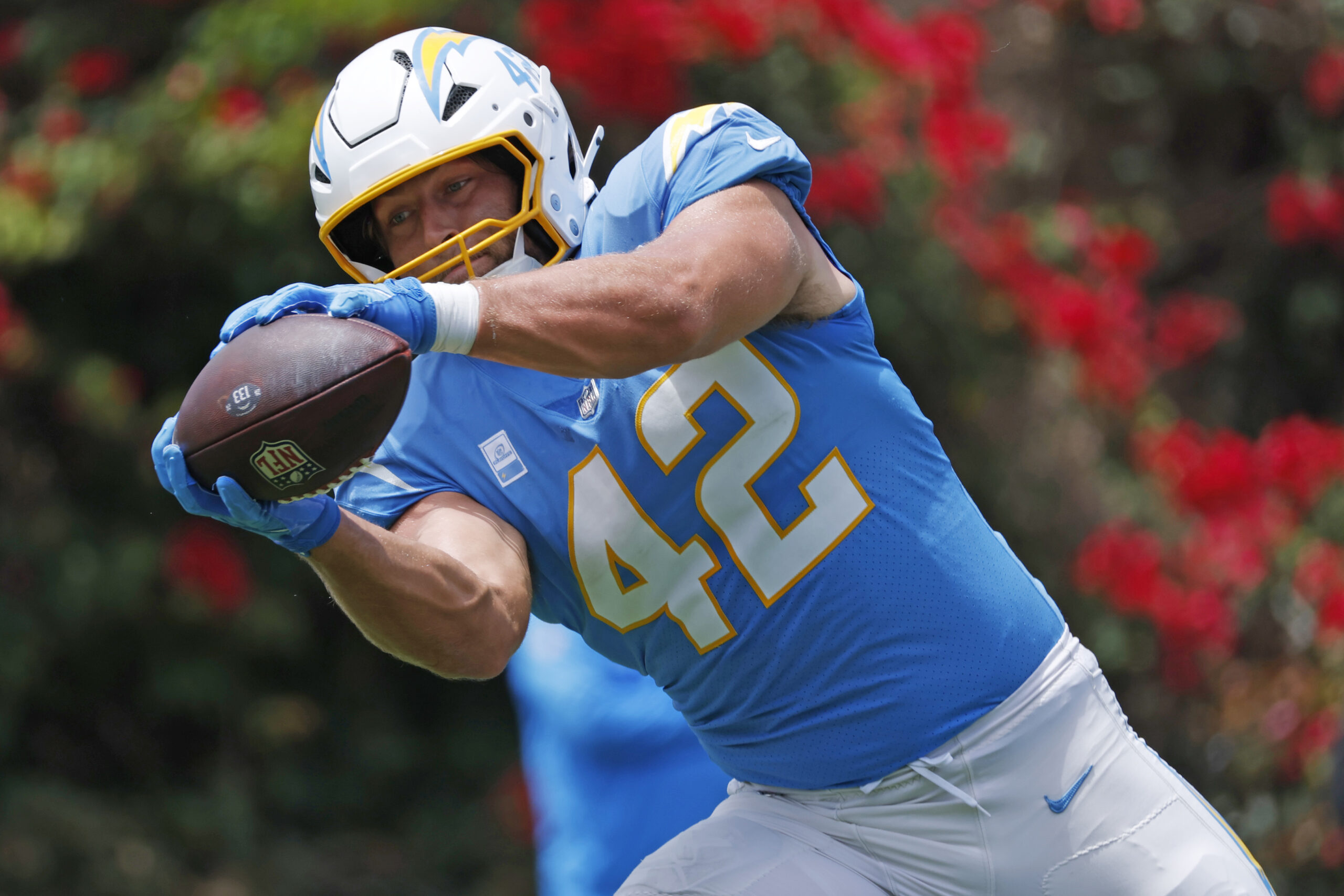 Chargers tight end Tucker Fisk catches a pass during a...