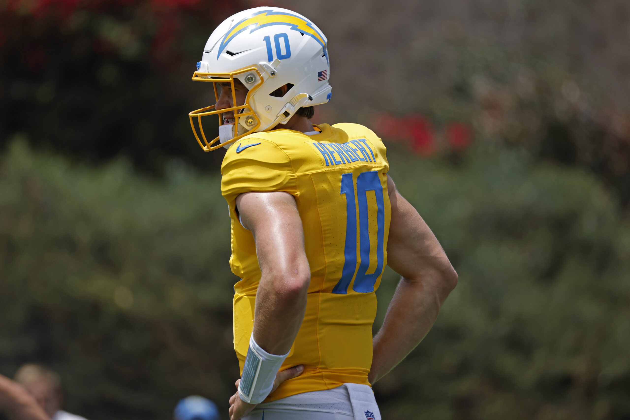 Chargers quarterback Justin Herbert looks on during a practice at...