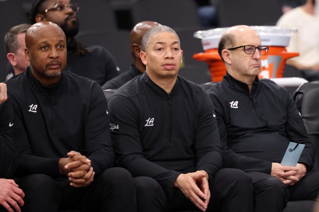 Dec 4, 2024; Inglewood, California, USA; Los Angeles Clippers head coach Tyronn Lue (center) and assistant coaches Brian Show (left) and Jeff Van Gundy (right) watch from the bench during the second half against the Minnesota Timberwolves at Intuit Dome.