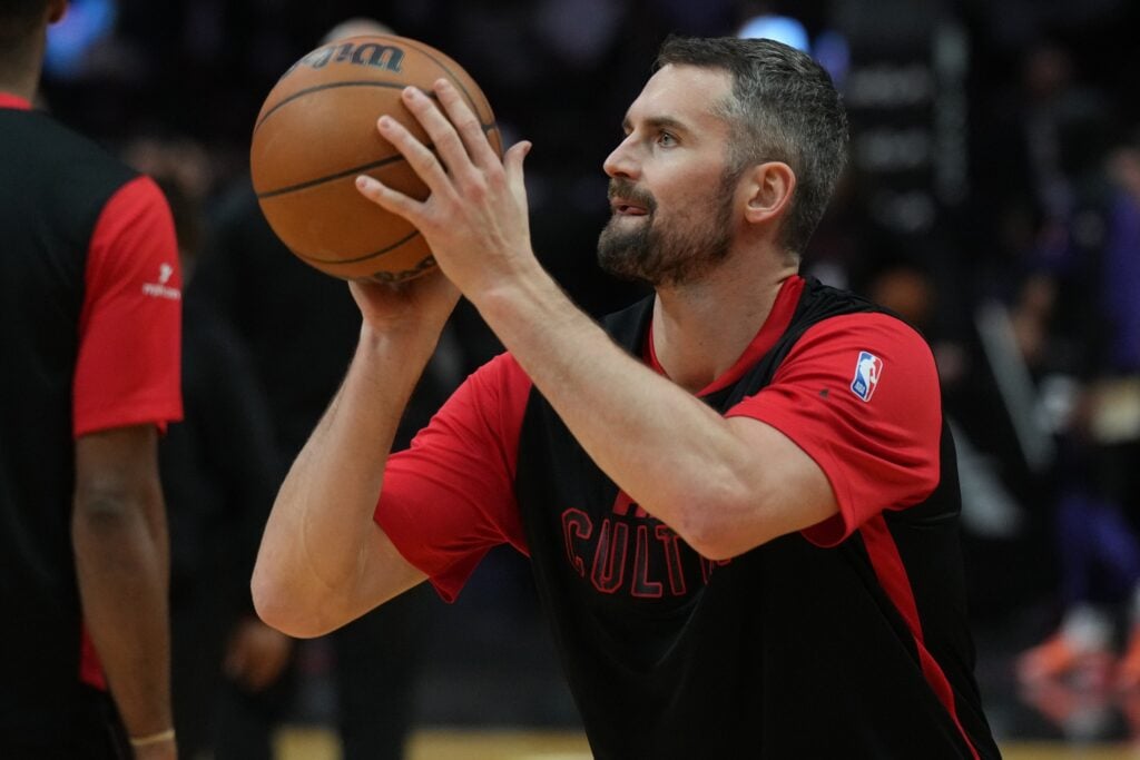 Dec 7, 2024; Miami, Florida, USA; Miami Heat forward Kevin Love (42) warms-up before a game against the Phoenix Suns at Kaseya Center. Mandatory Credit: Jim Rassol-Imagn Images