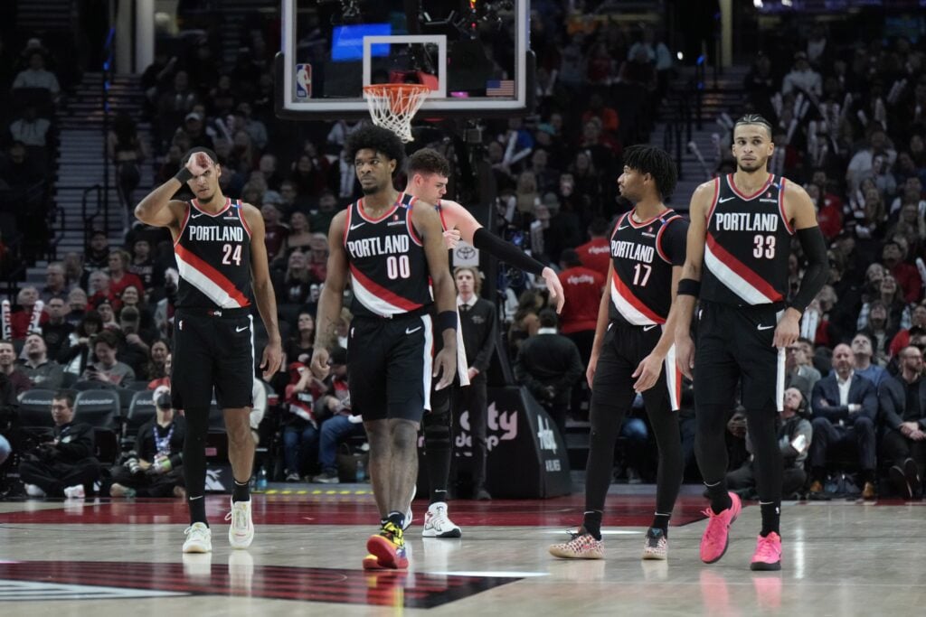 Portland Trail Blazers (from left to right) Kris Murray (24), Scoot Henderson (00), Donovan Clingan (23), Shaedon Sharpe (17) and Toumani Camara (33) walk back to the court after a timeout during the second half against the Brooklyn Nets at Moda Center.