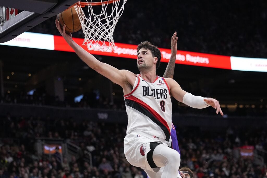 Portland Trail Blazers forward Deni Avdija (8) goes up to make a basket against the Toronto Raptors during the second half at Scotiabank Arena. 