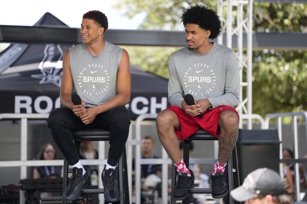 San Antonio first round draft picks Carter Bryant (left) and Dylan Harper answer questions during the Spurs Family Cookout at Victory Capital Performance Center. 