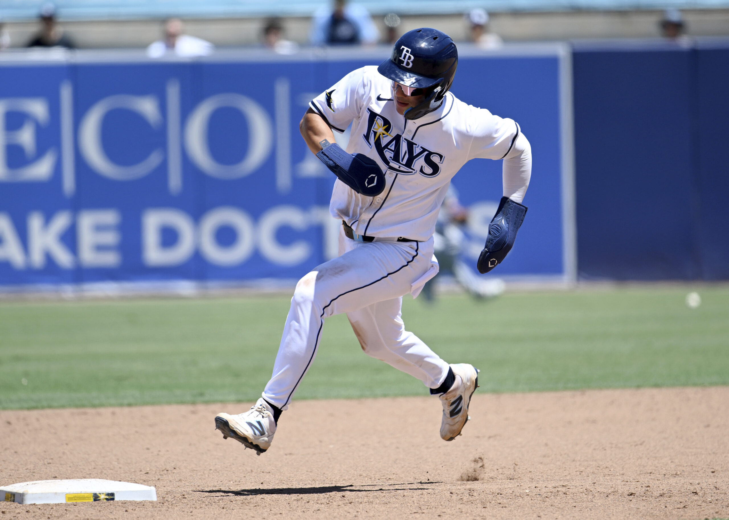 Tampa Bay Rays’ Ha-Seong Kim rounds second base on his...
