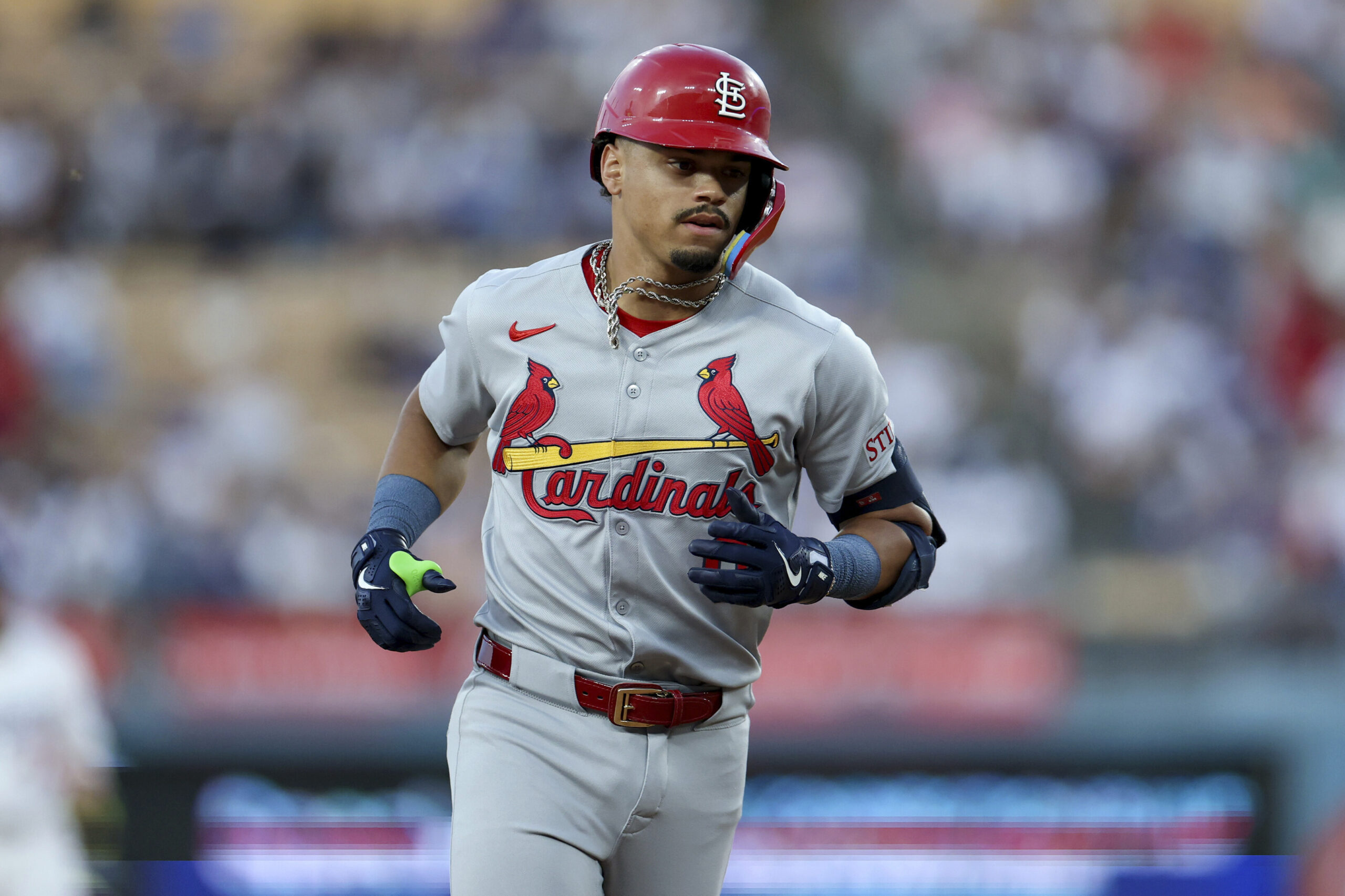 St. Louis Cardinals’ Masyn Winn runs the bases after hitting...