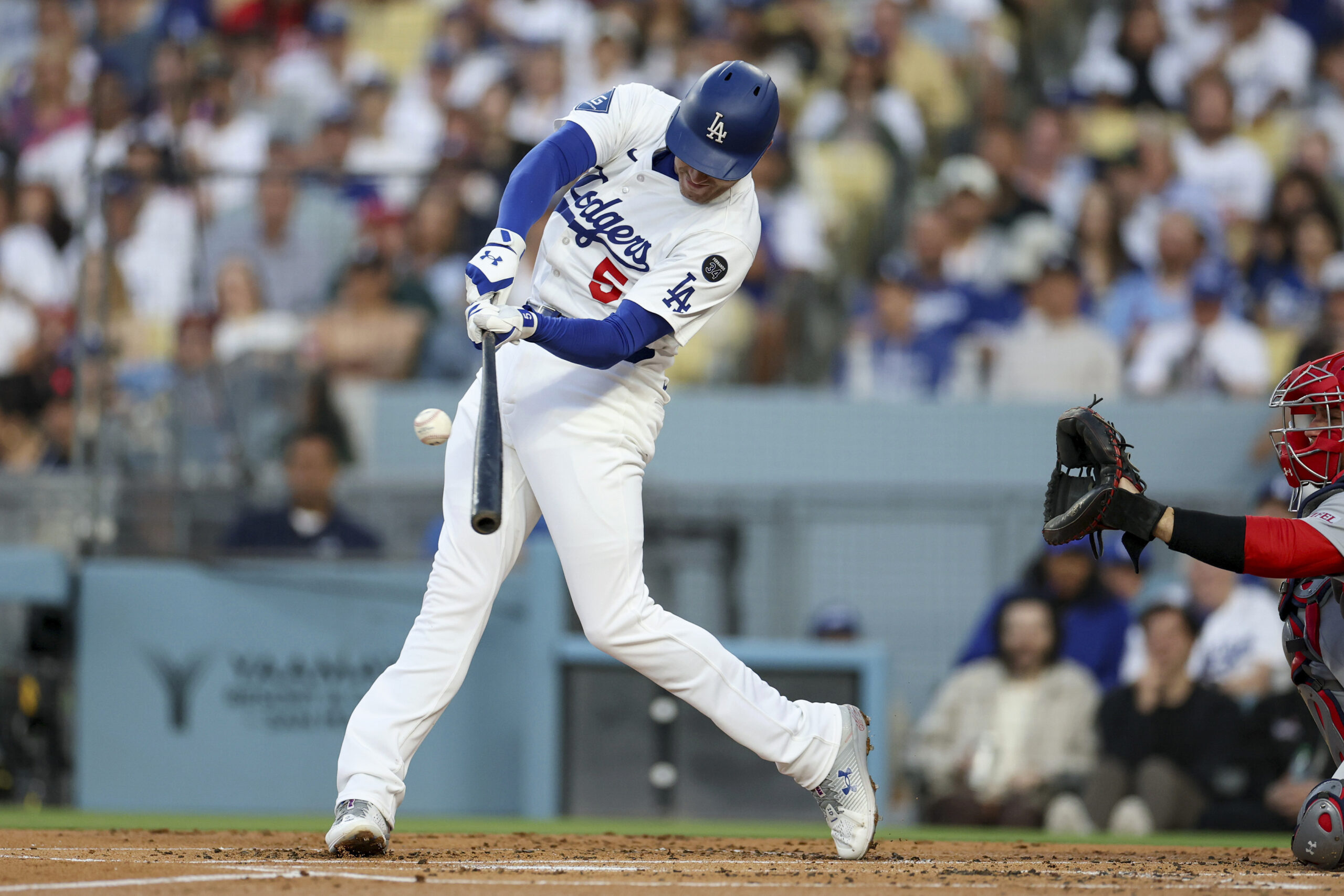 Los Angeles Dodgers first baseman Freddie Freeman (5) makes contact...
