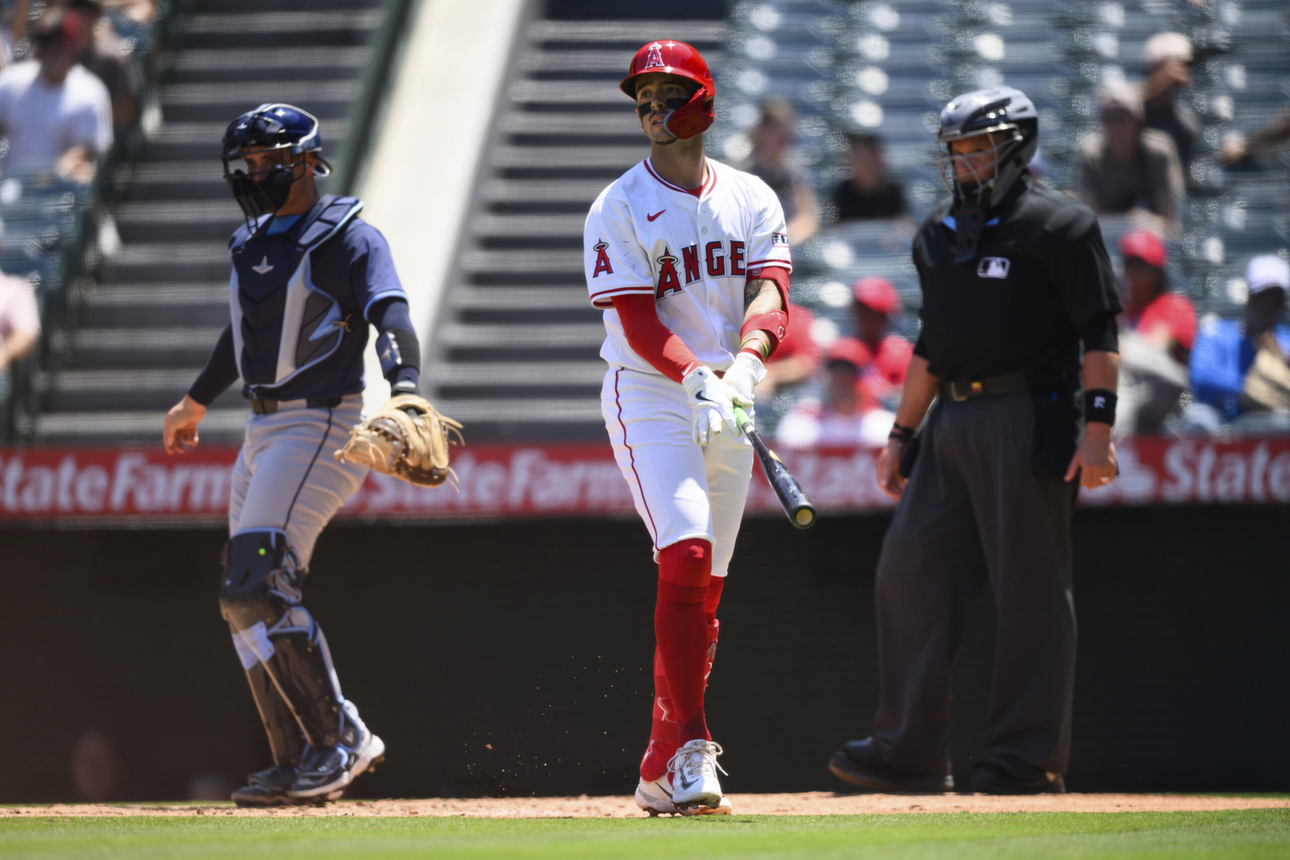 Angels’ Zach Neto is dejected after striking out during the...