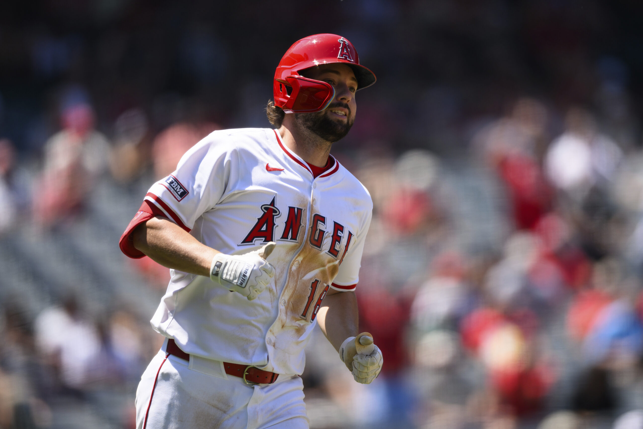 Angels’ Nolan Schanuel runs after hitting a RBI single during...