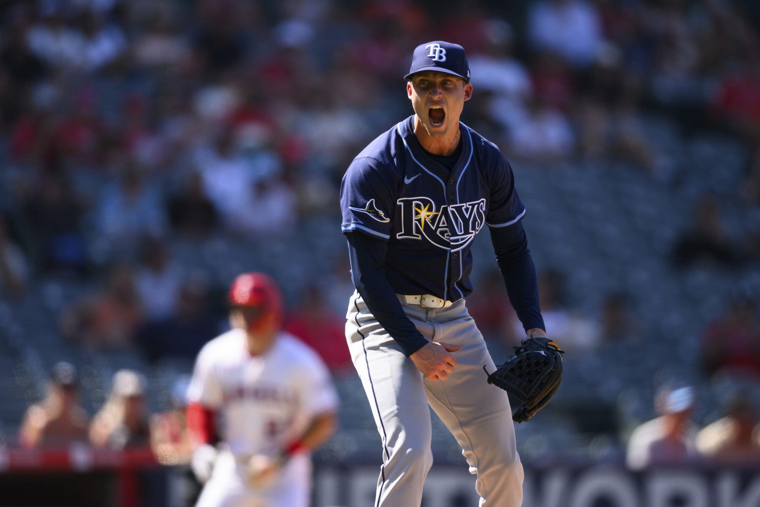 Tampa Bay Rays pitcher Griffin Jax reacts after striking out...