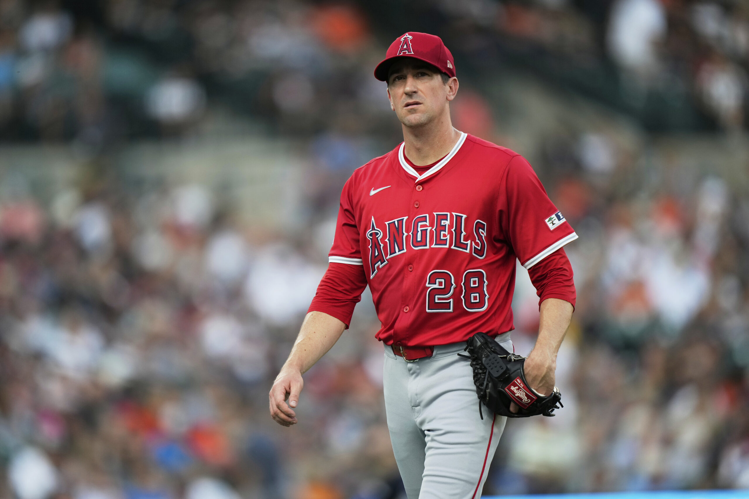 Angels starting pitcher Kyle Hendricks walks off the field during...