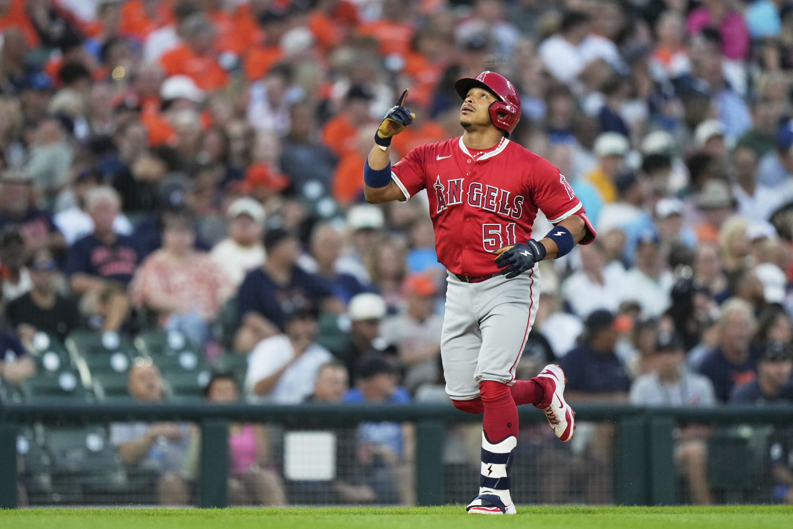 Angels’ Gustavo Campero celebrates after hitting a two-run home run...
