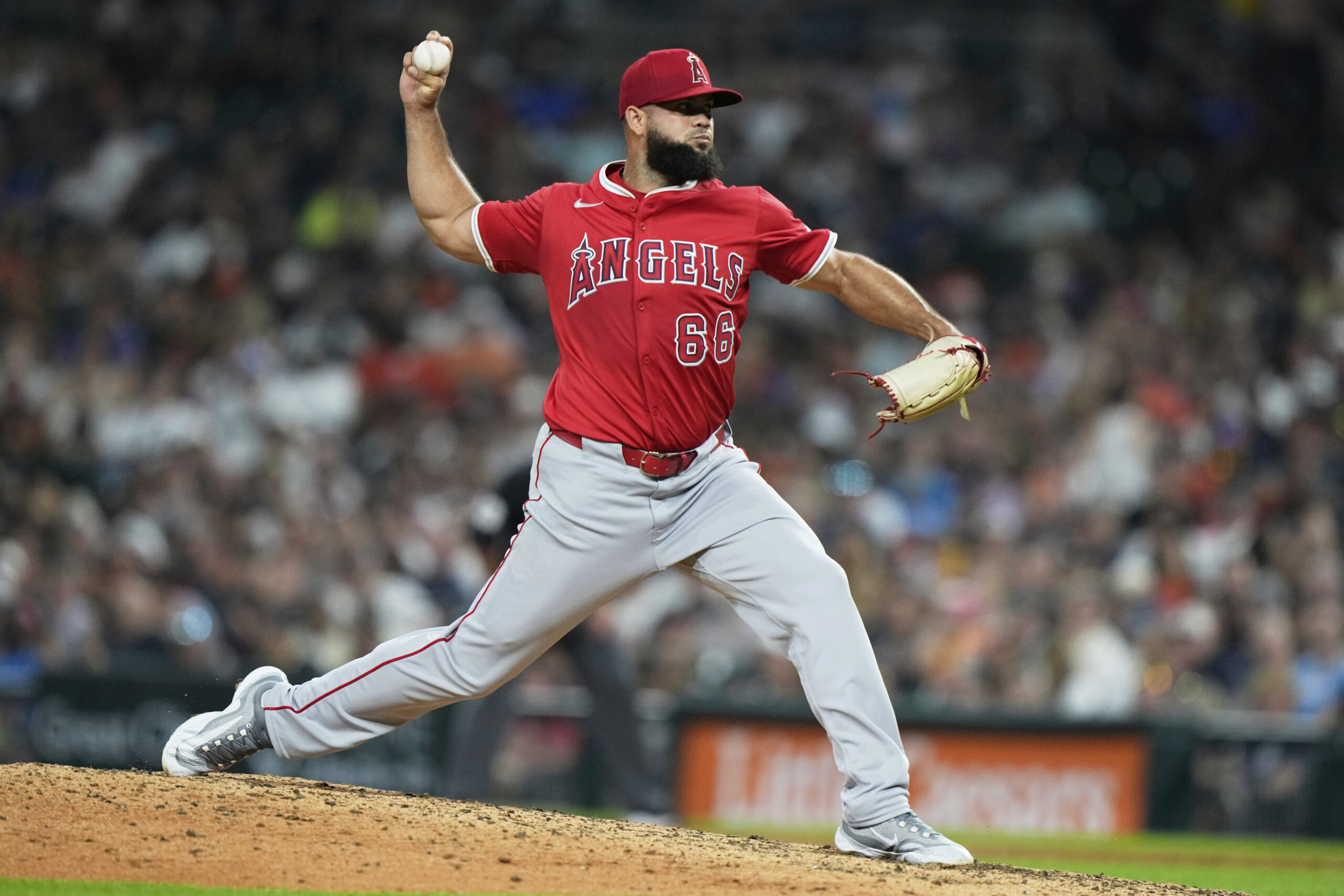 Angels relief pitcher Luis Garcia throws during the seventh inning...