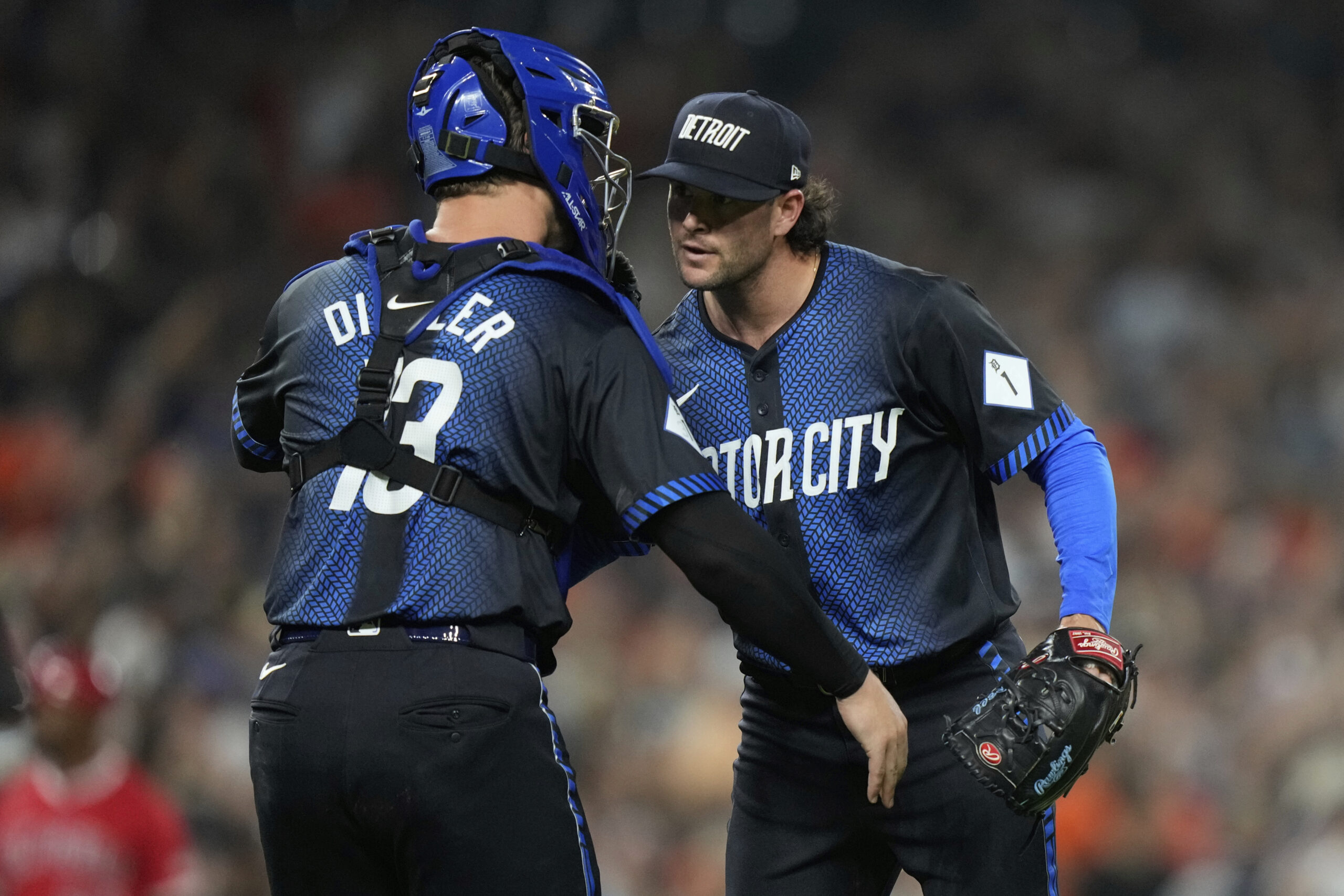 Detroit Tigers relief pitcher Kyle Finnegan, right, and catcher Dillon...