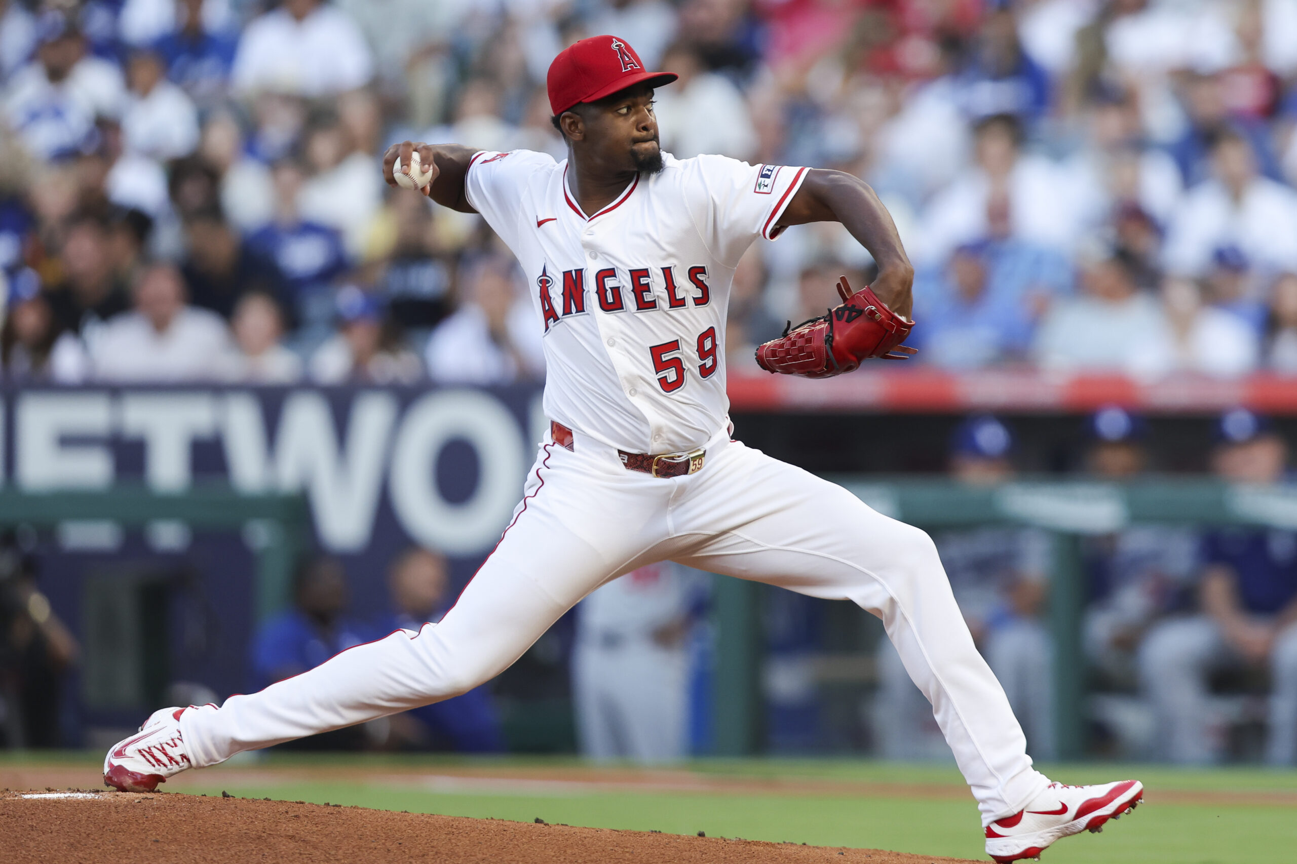 Angels starting pitcher José Soriano throws to the plate during...