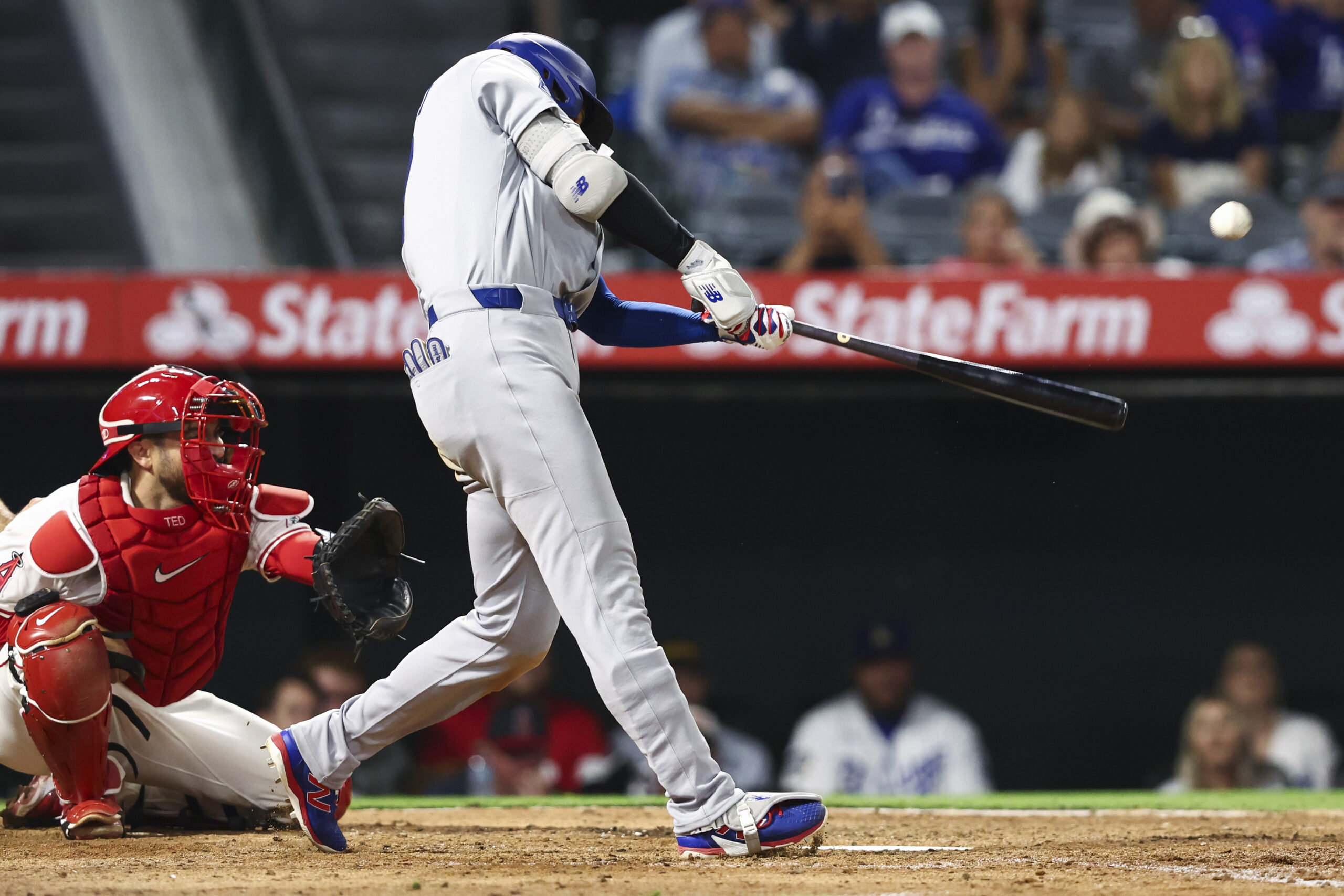 Dodgers star Shohei Ohtani hits a solo home run during...