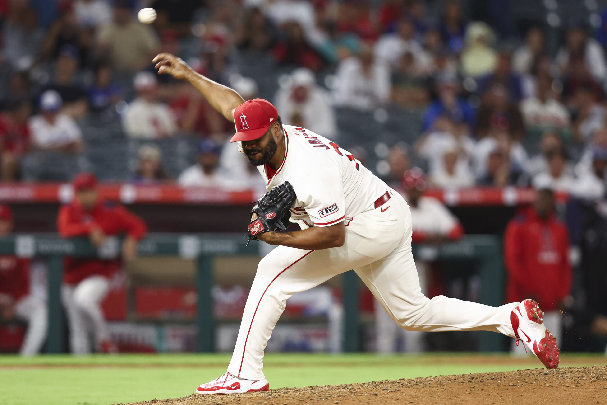 Angels relief pitcher Kenley Jansen throws to the plate during...