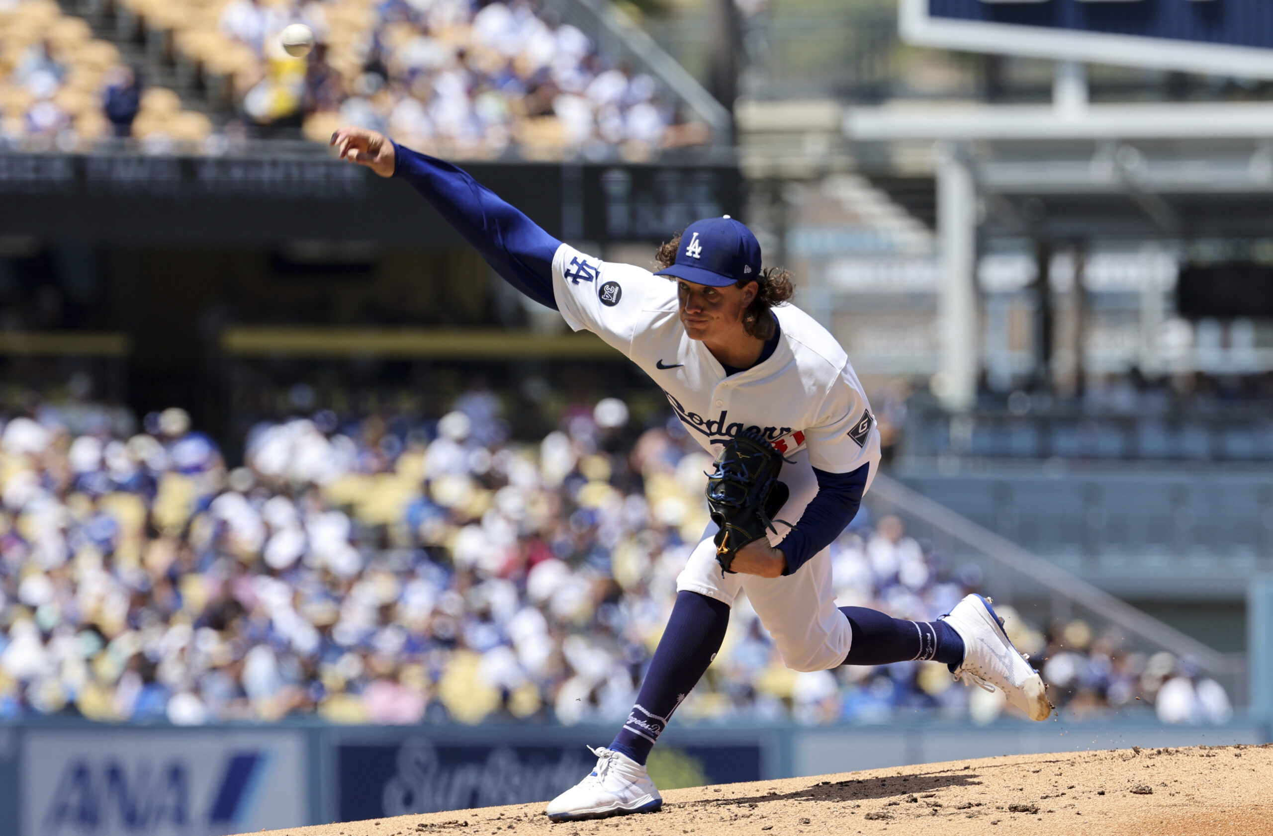 Dodgers starting pitcher Tyler Glasnow delivers against the San Diego...