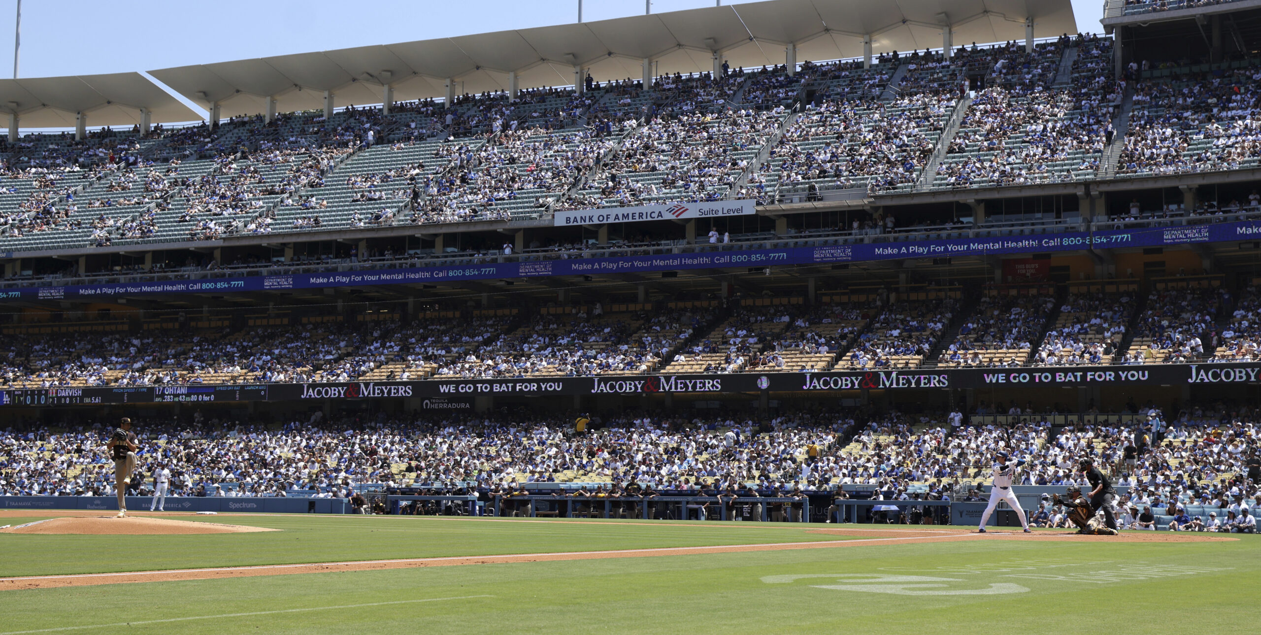 San Diego Padres starting pitcher Yu Darvish, left, delivers against...