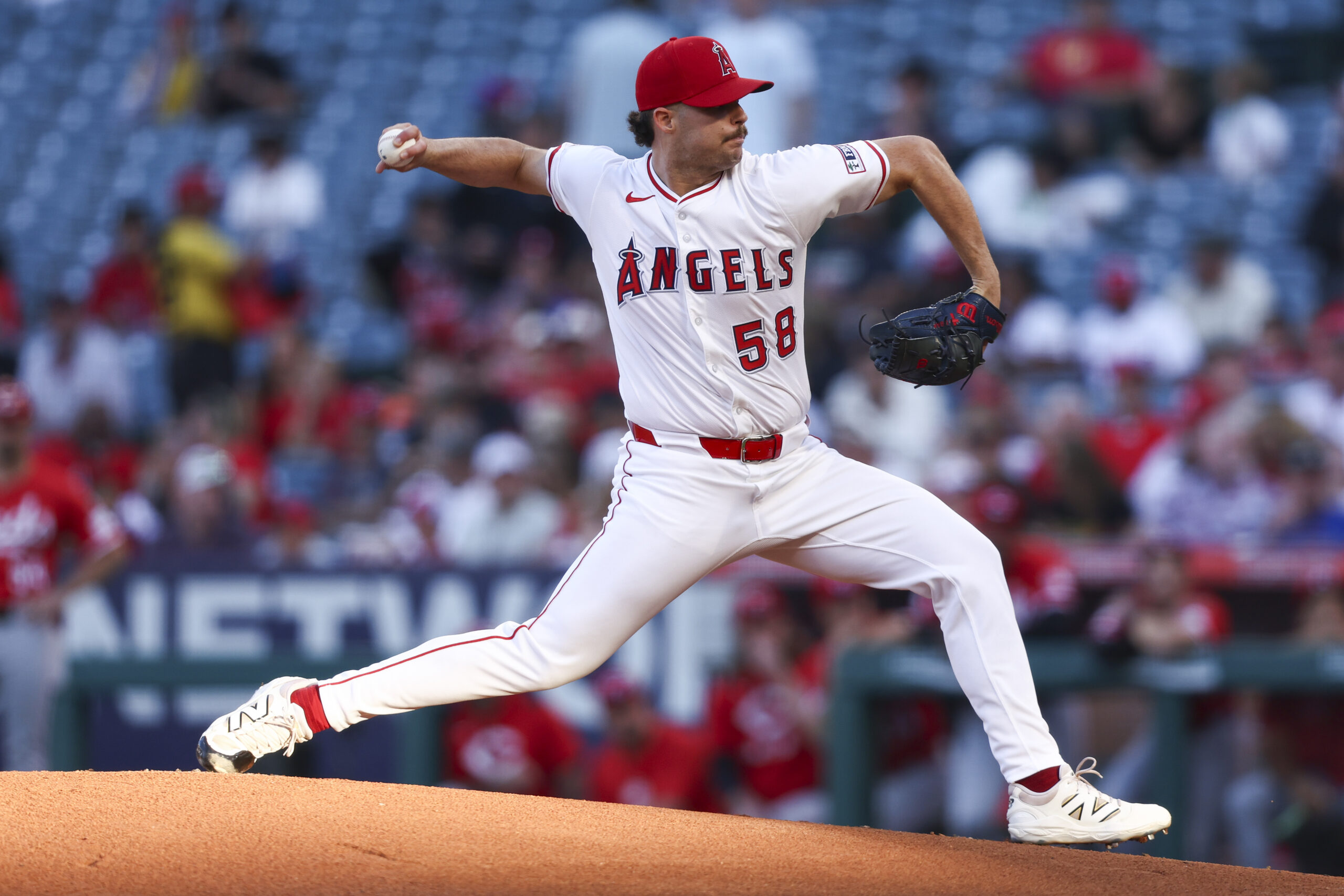 Angels starting pitcher Victor Mederos throws to the plate during...