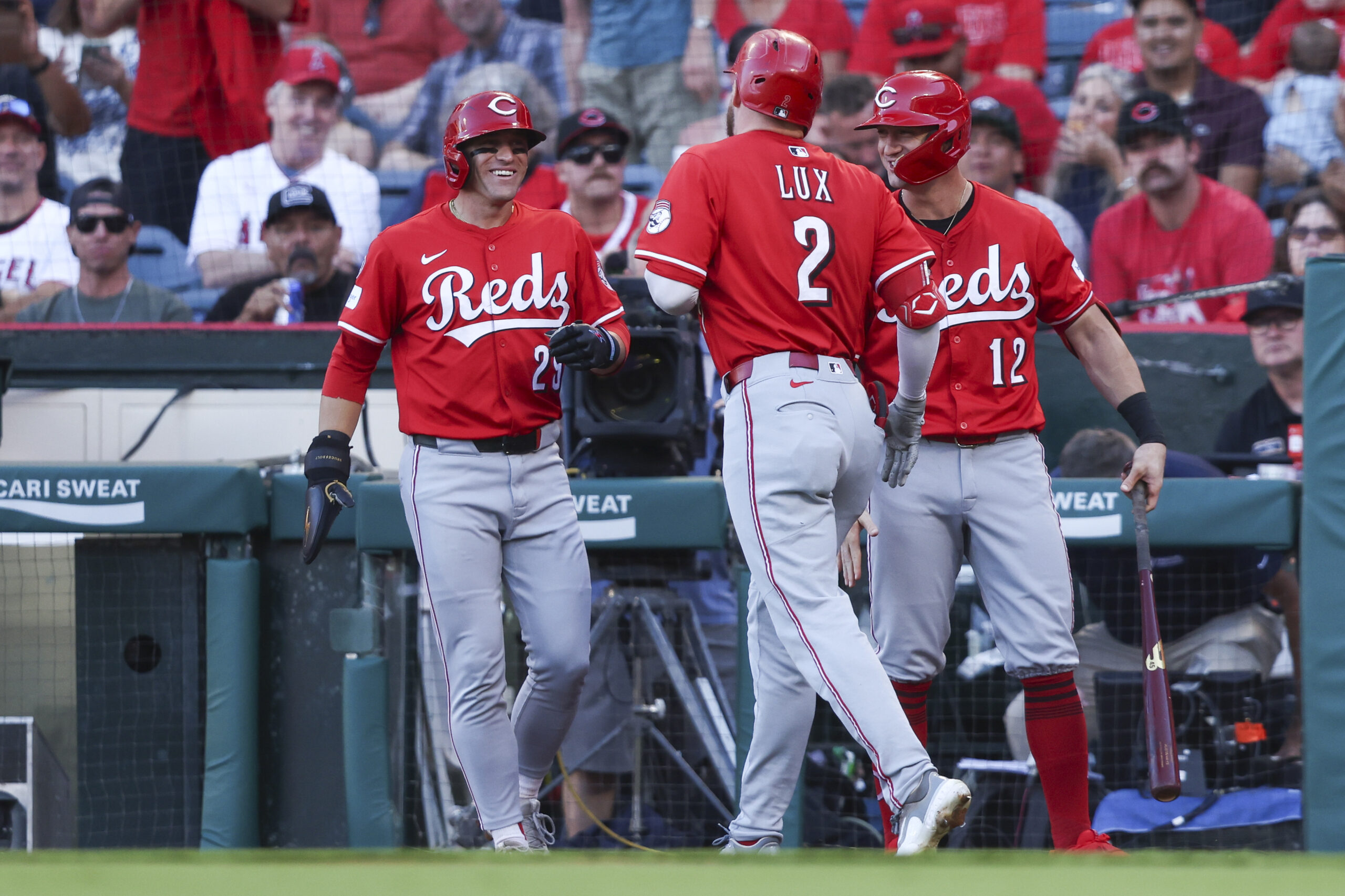 Cincinnati Reds designated hitter Gavin Lux (2) celebrates with TJ...