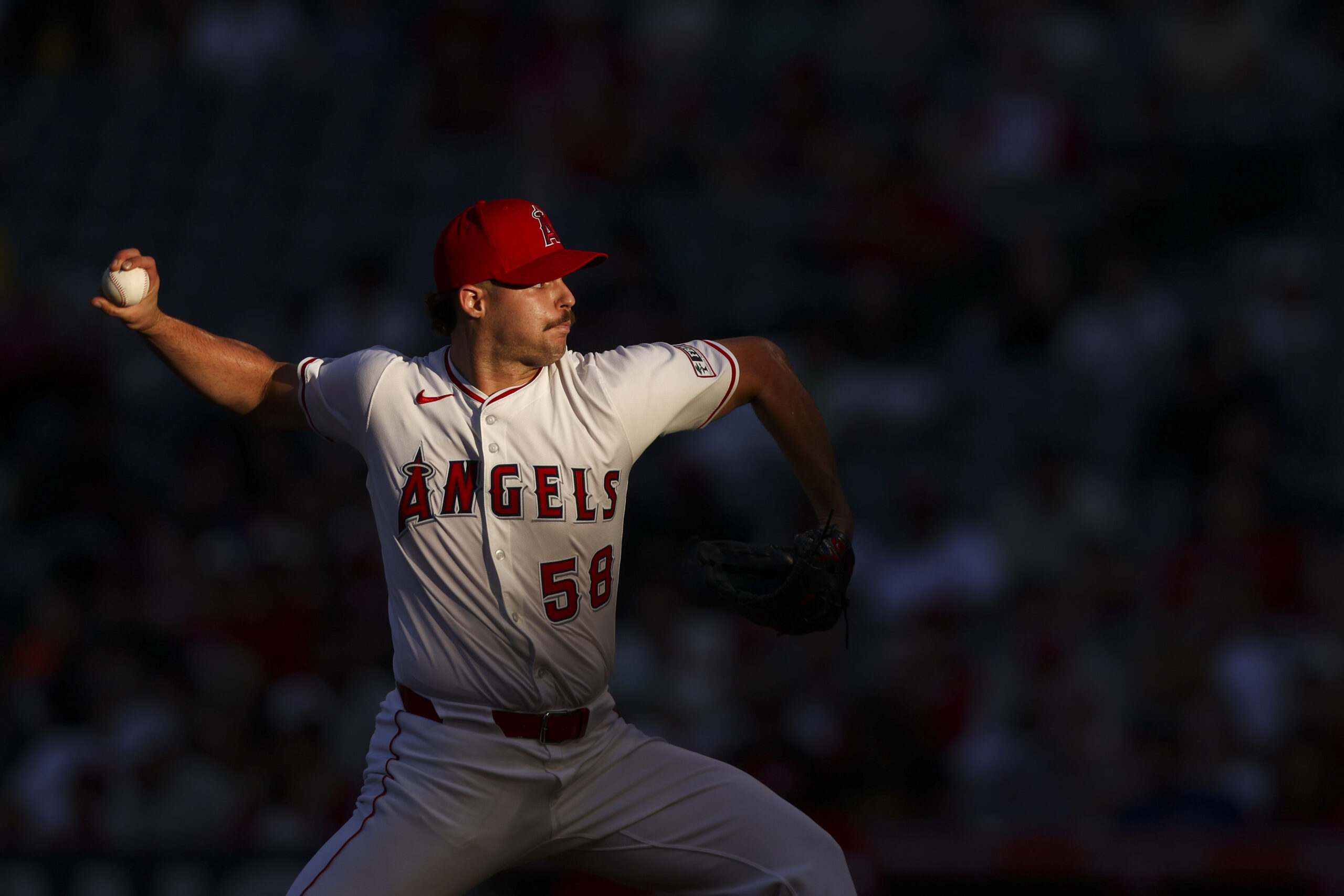 Angels starting pitcher Victor Mederos throws to a Cincinnati Reds...