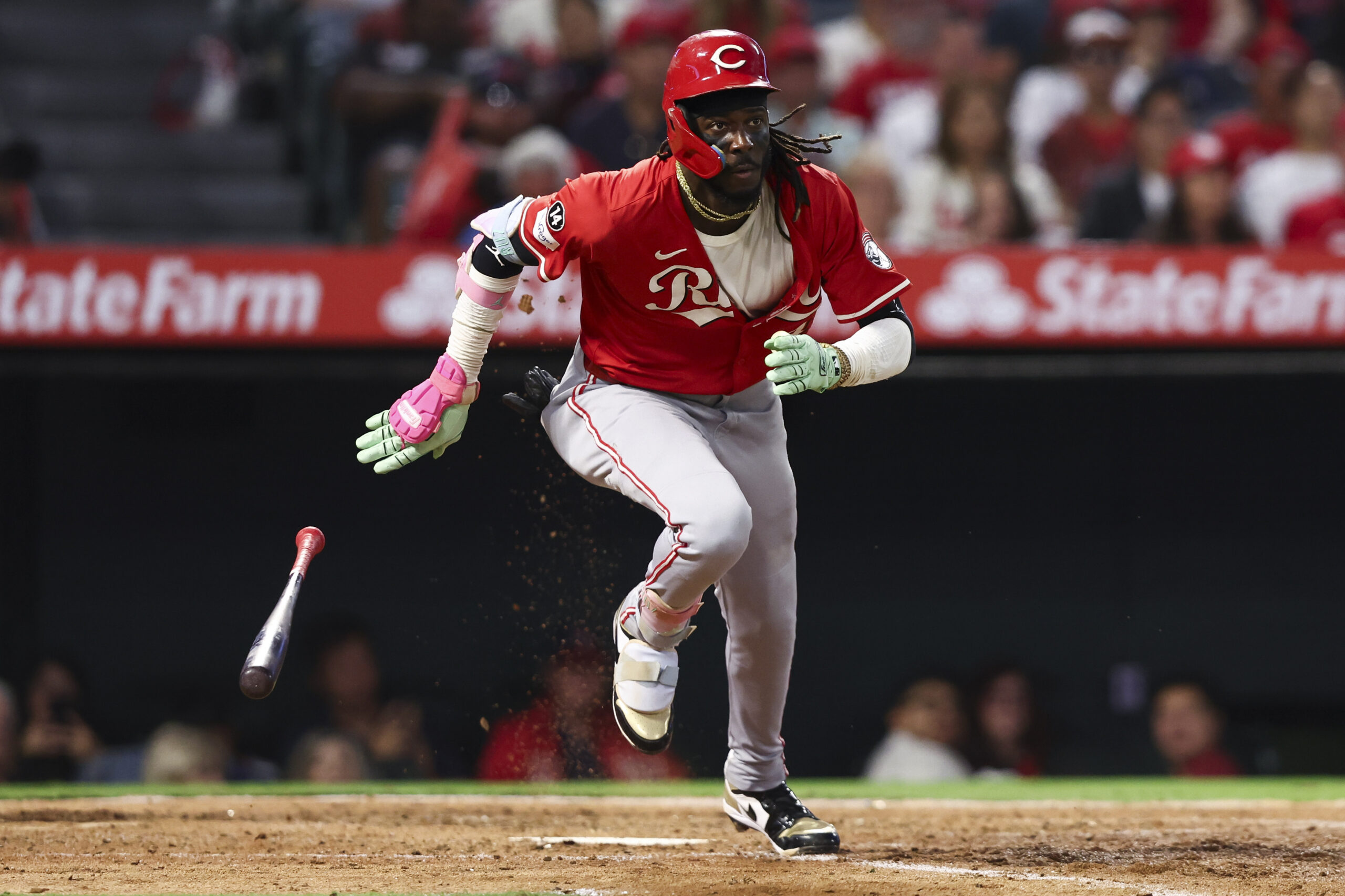 The Cincinnati Reds’ Elly De La Cruz drops his bat...