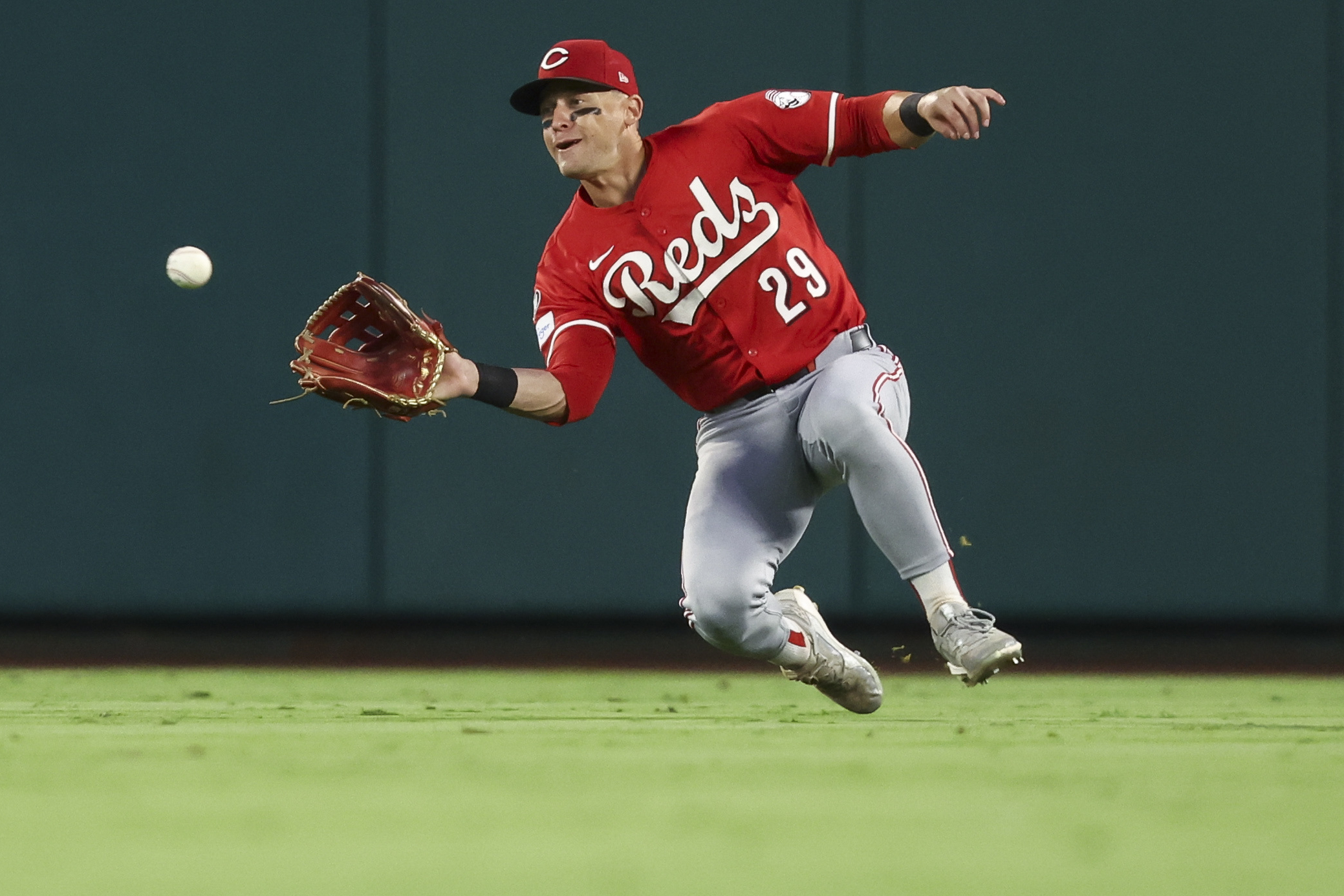 Cincinnati Reds center fielder TJ Friedl (29) makes a catch...