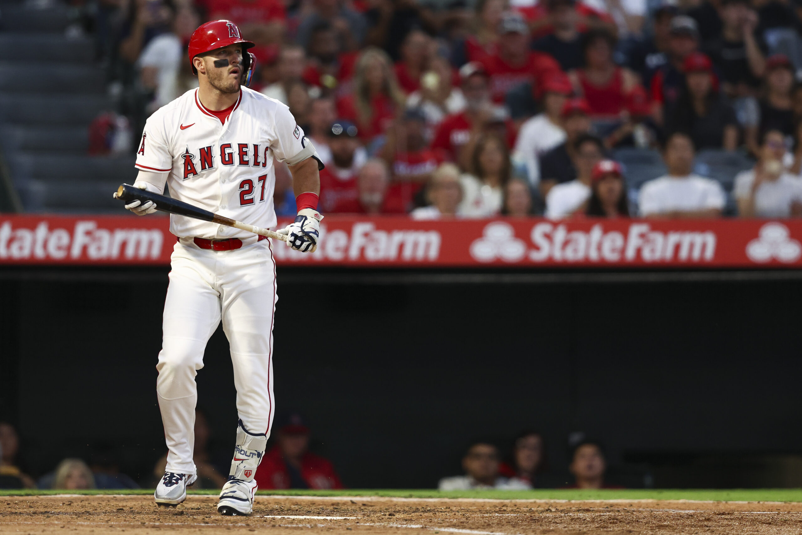 Angels star Mike Trout reacts after striking out during the...