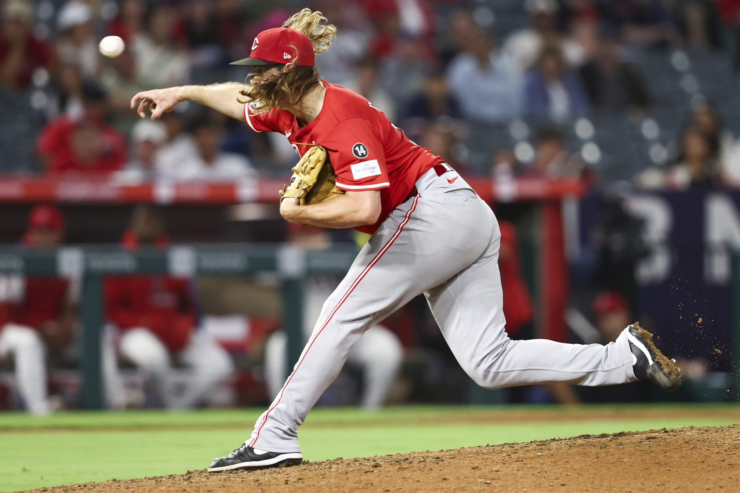 Cincinnati Reds pitcher Scott Barlow throws to an Angels batter...