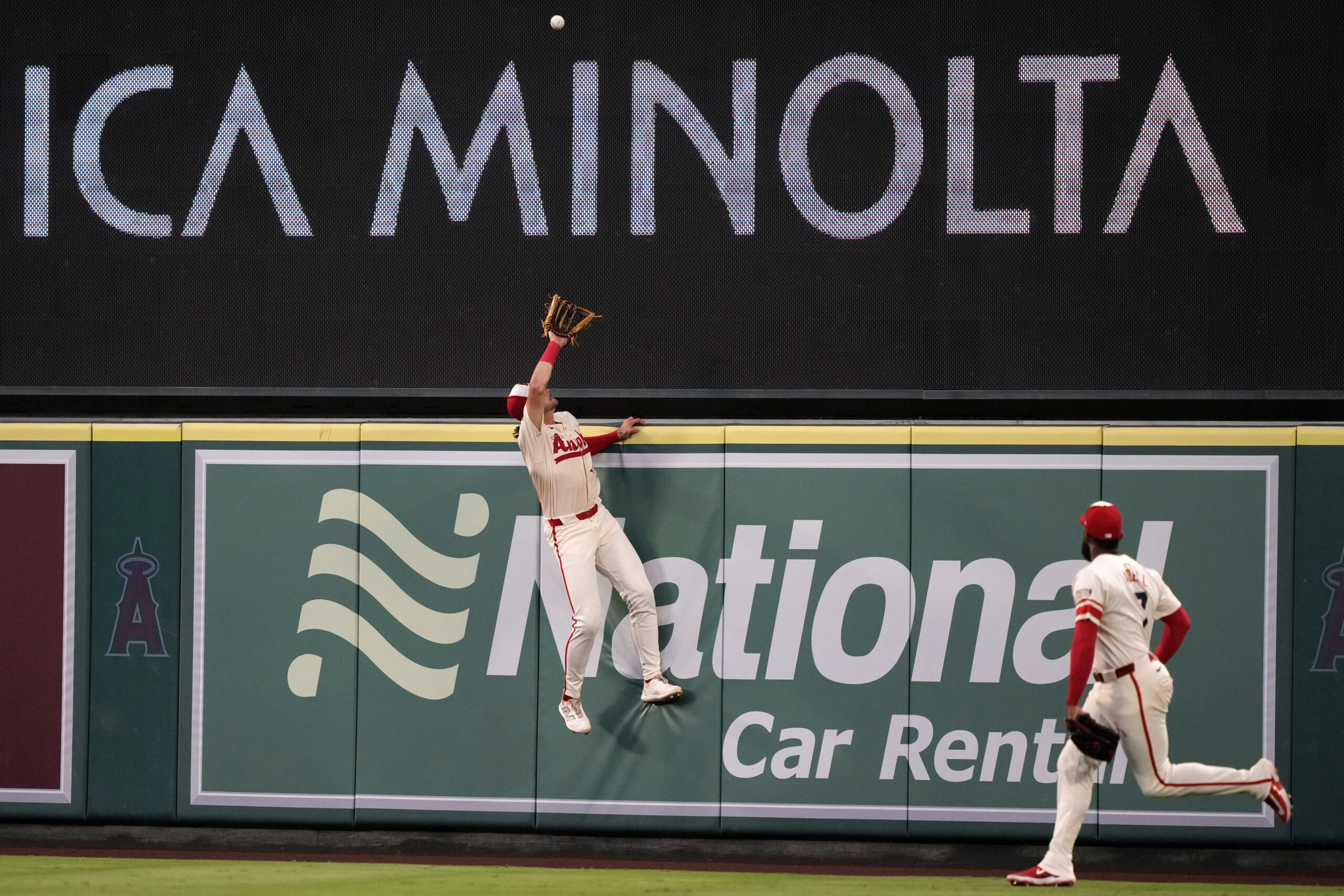 Angels center fielder Bryce Teodosio, can’t get to a ball...