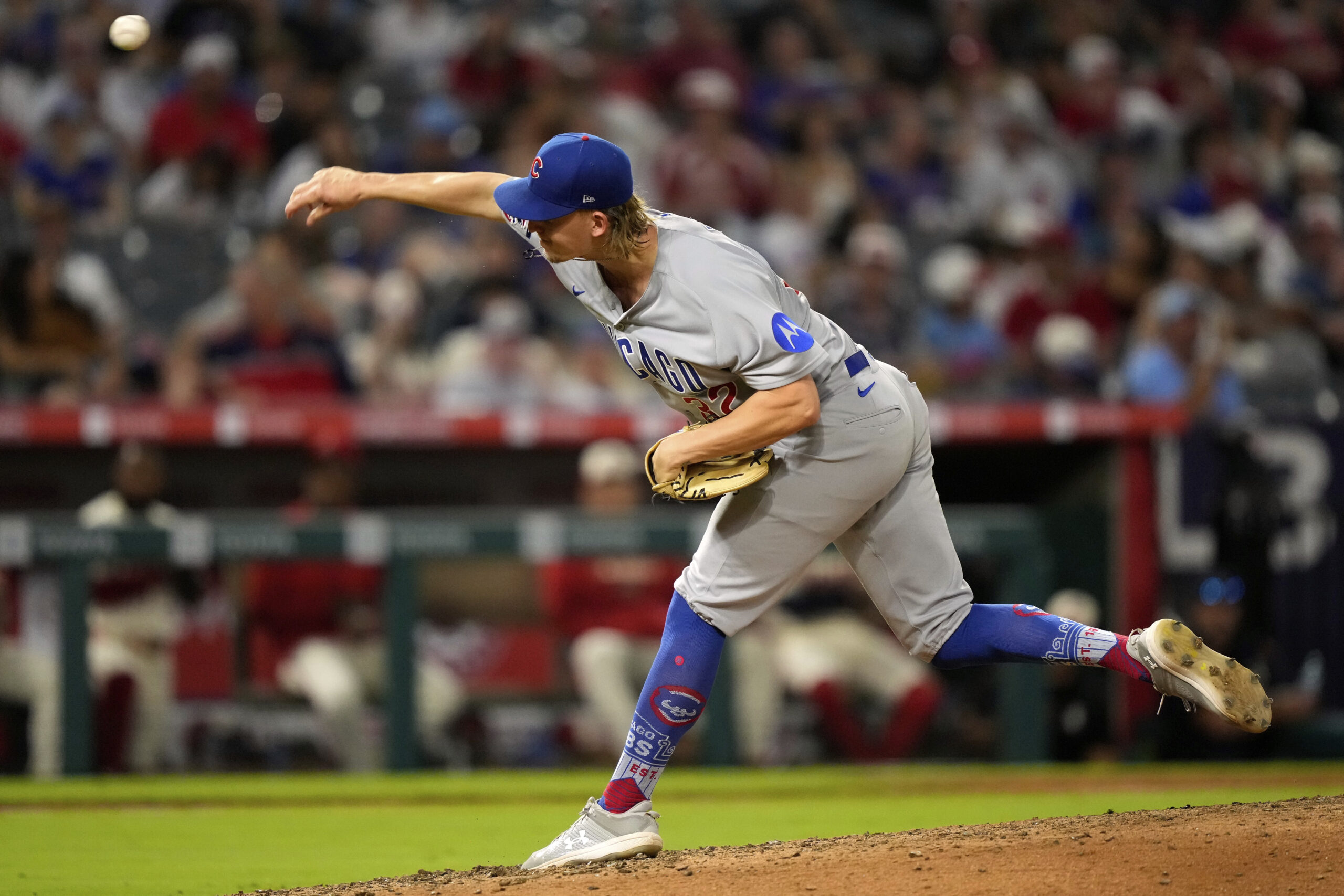 Chicago Cubs starting pitcher Ben Brown throws to the plate...