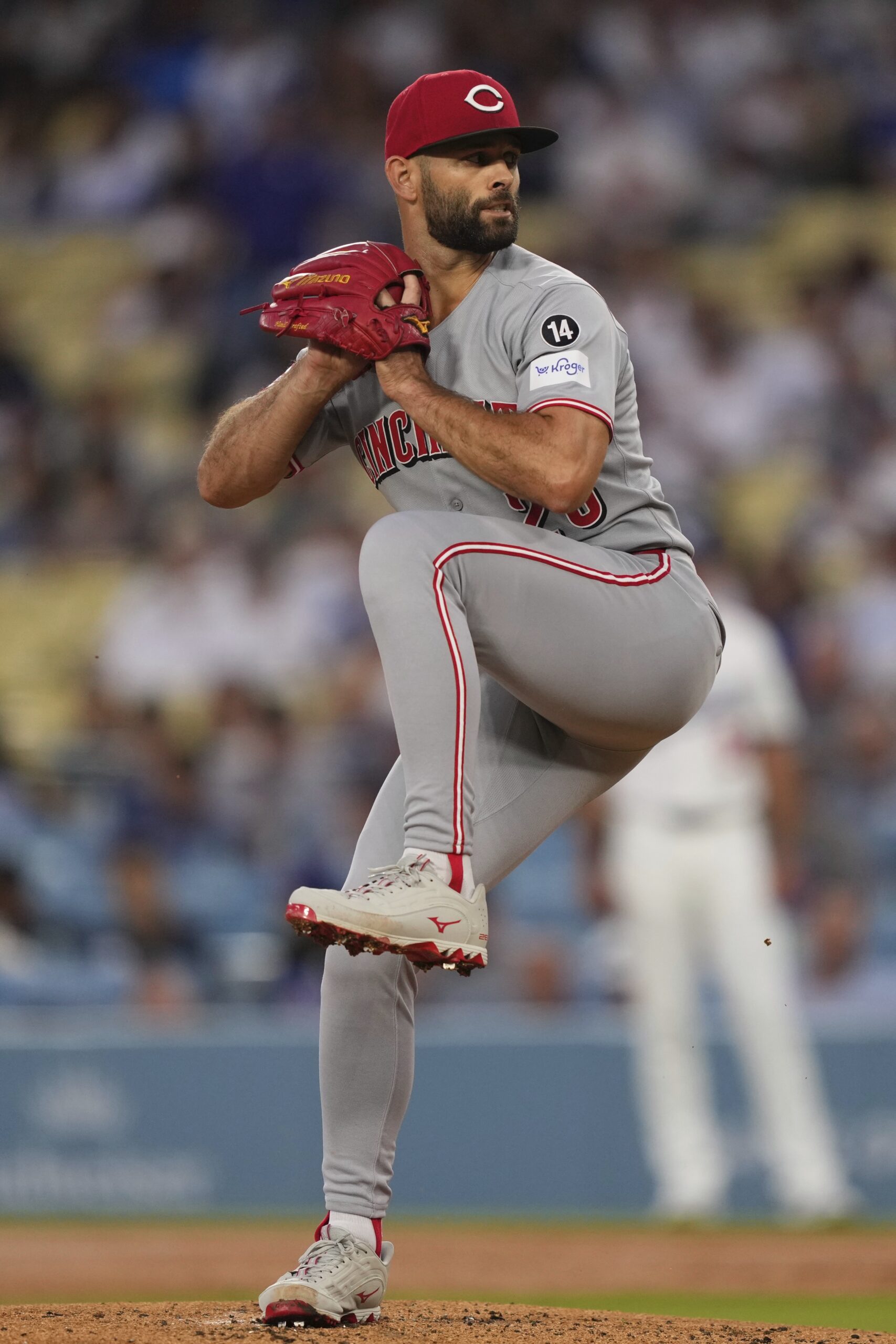 Cincinnati Reds starting pitcher Nick Martinez throws to the plate...