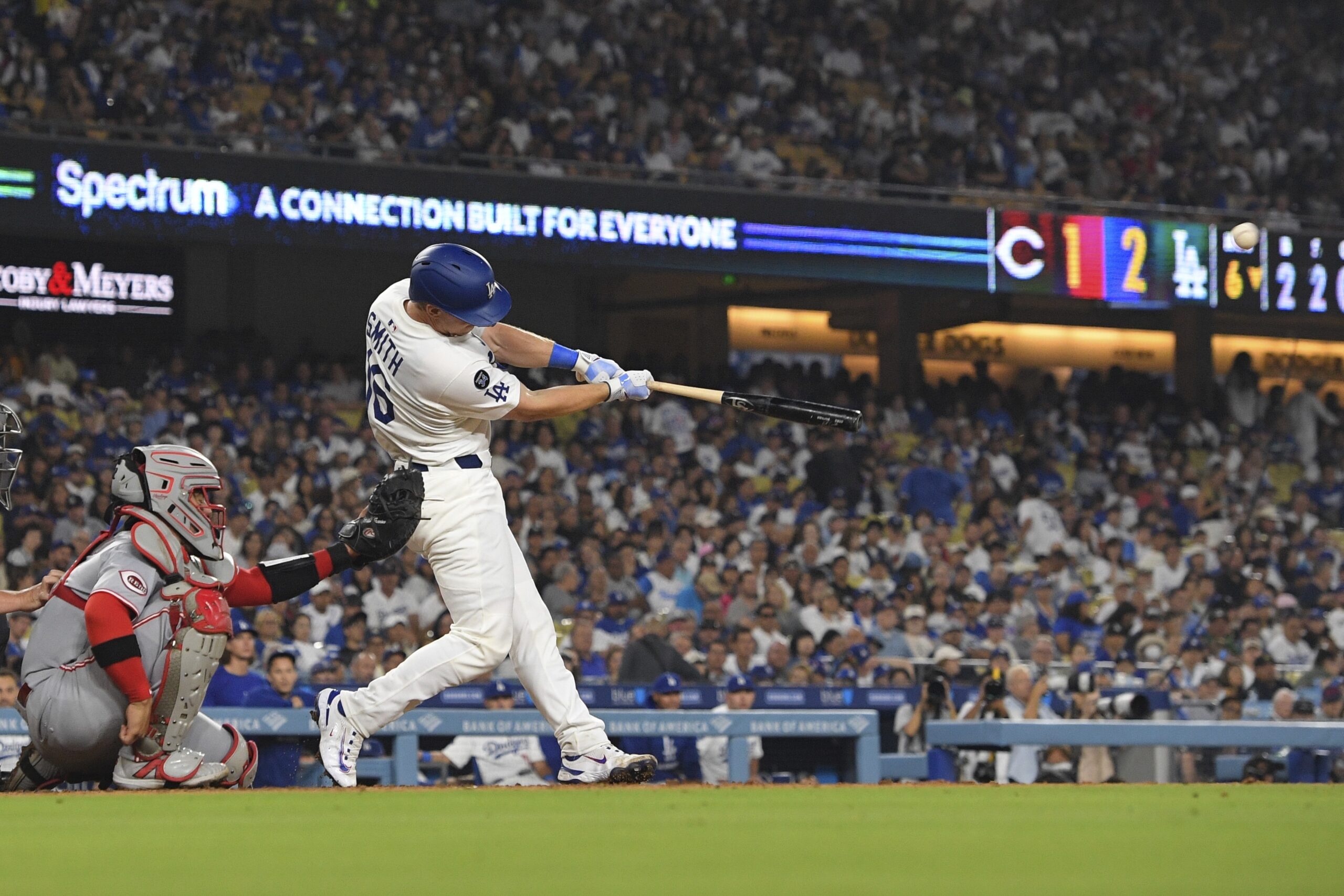 The Dodgers’ Will Smith hits a solo home run during...