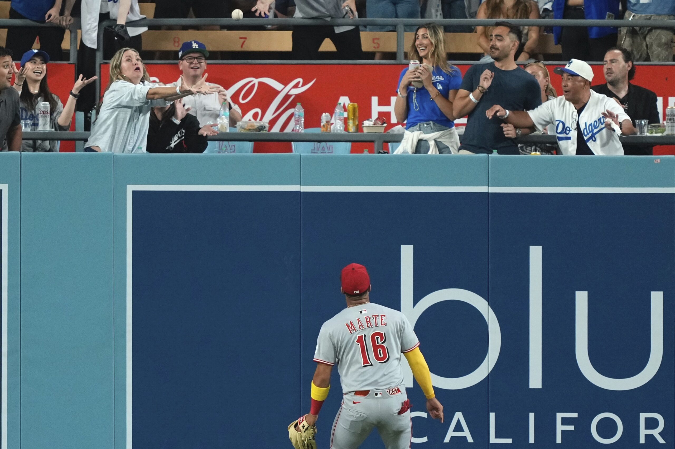 Cincinnati Reds center fielder Noelvi Marte watches a ball hit...
