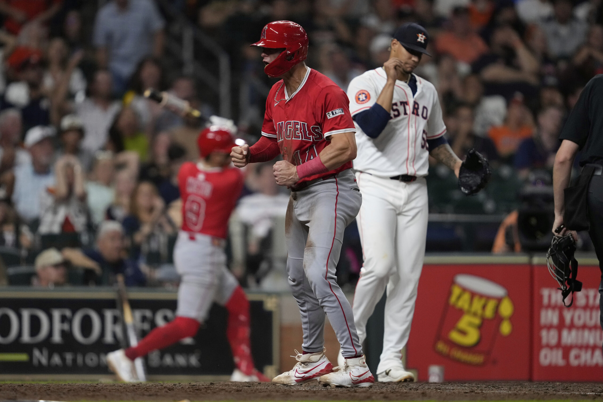 Angels’ Logan O’Hoppe (14) celebrates after scoring off of a...
