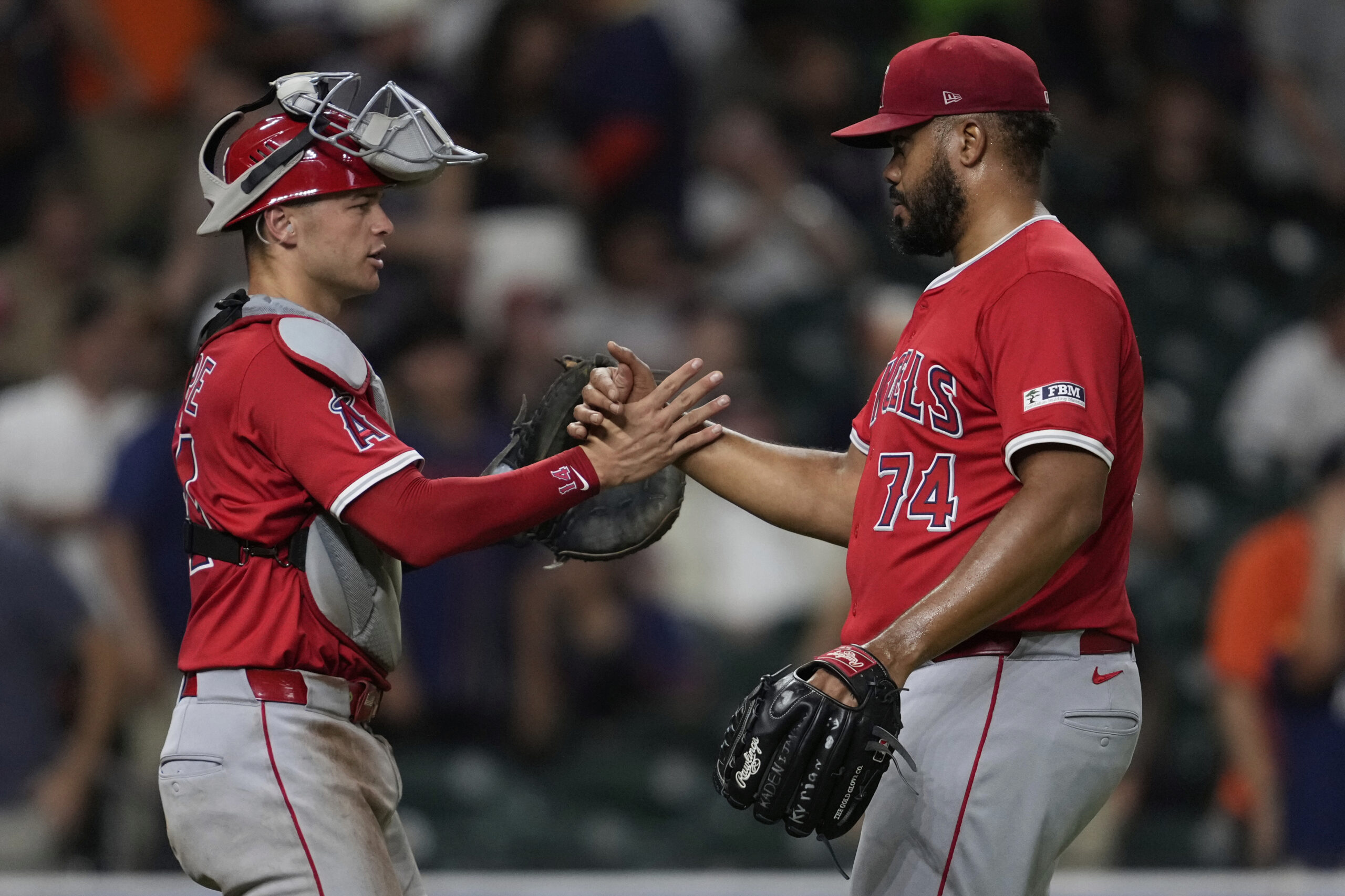 Angels catcher Logan O’Hoppe and relief pitcher Kenley Jansen (74)...