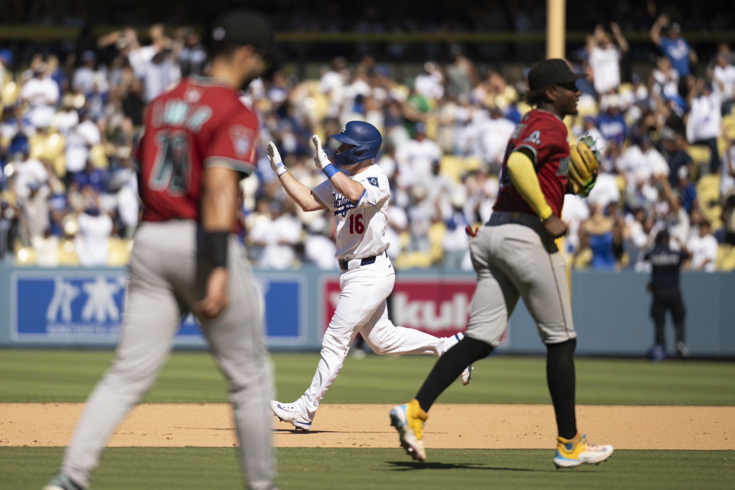 Dodgers’ Will Smith (16) gestures after hitting a walkoff solo...
