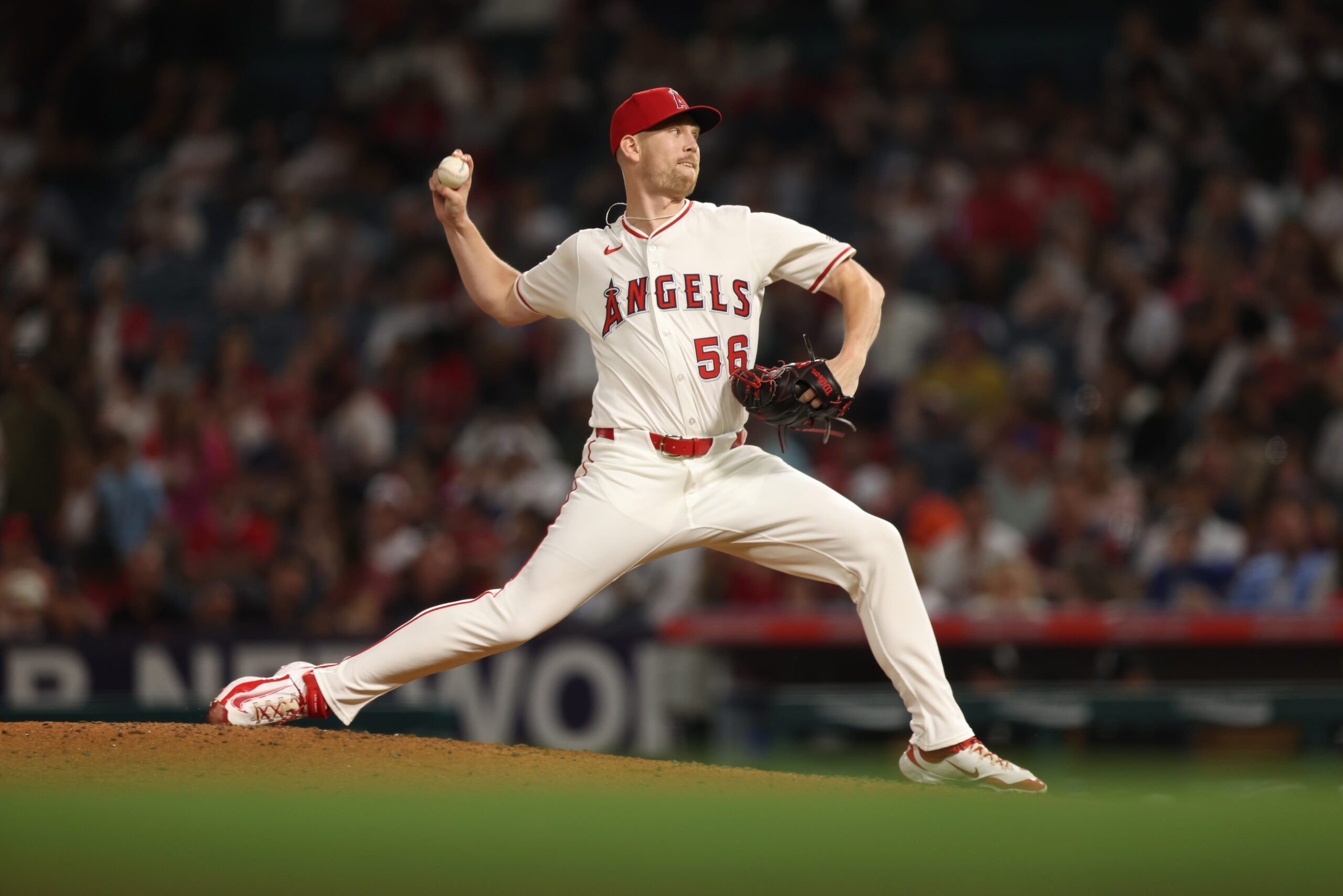 Pitcher Ryan Zeferjahn #56 of the Angels throws a pitch...