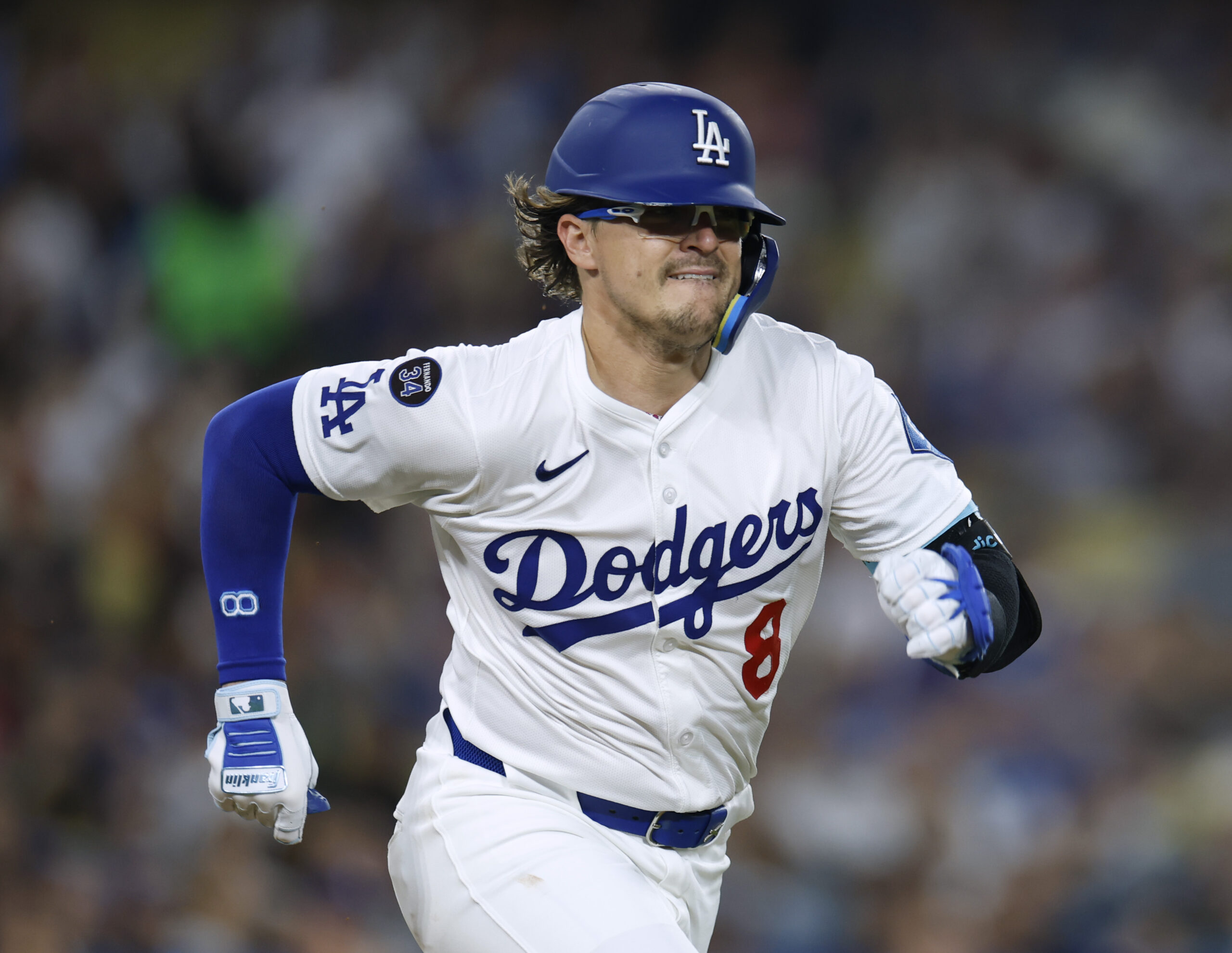 The Dodgers’ Kike Hernandez runs out a single during the...