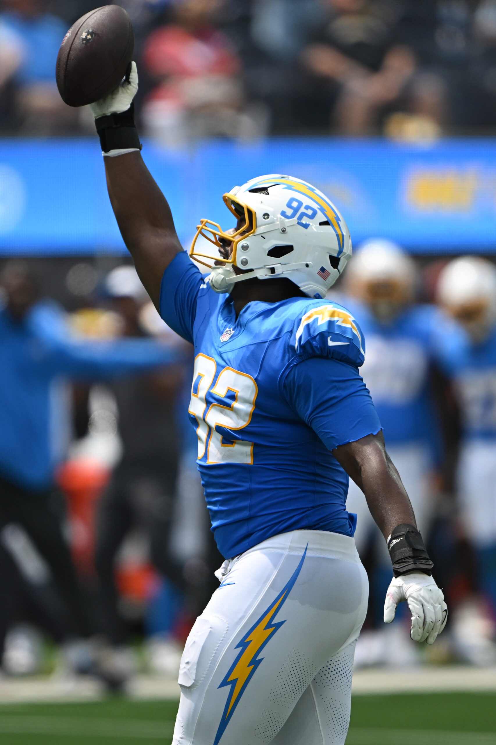 The Chargers Justin Eboigbe, #92, celebrates a fumble recovery from...