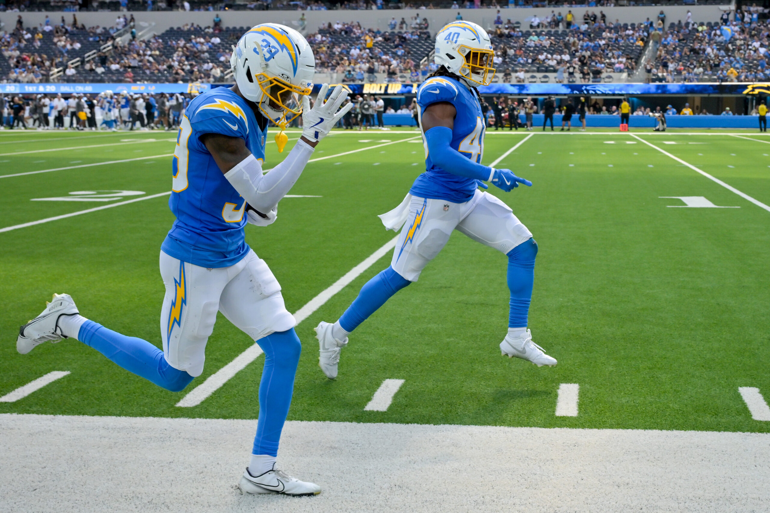 The Chargers Charlie Smyth, #39, celebrates a fourth quarter interception...