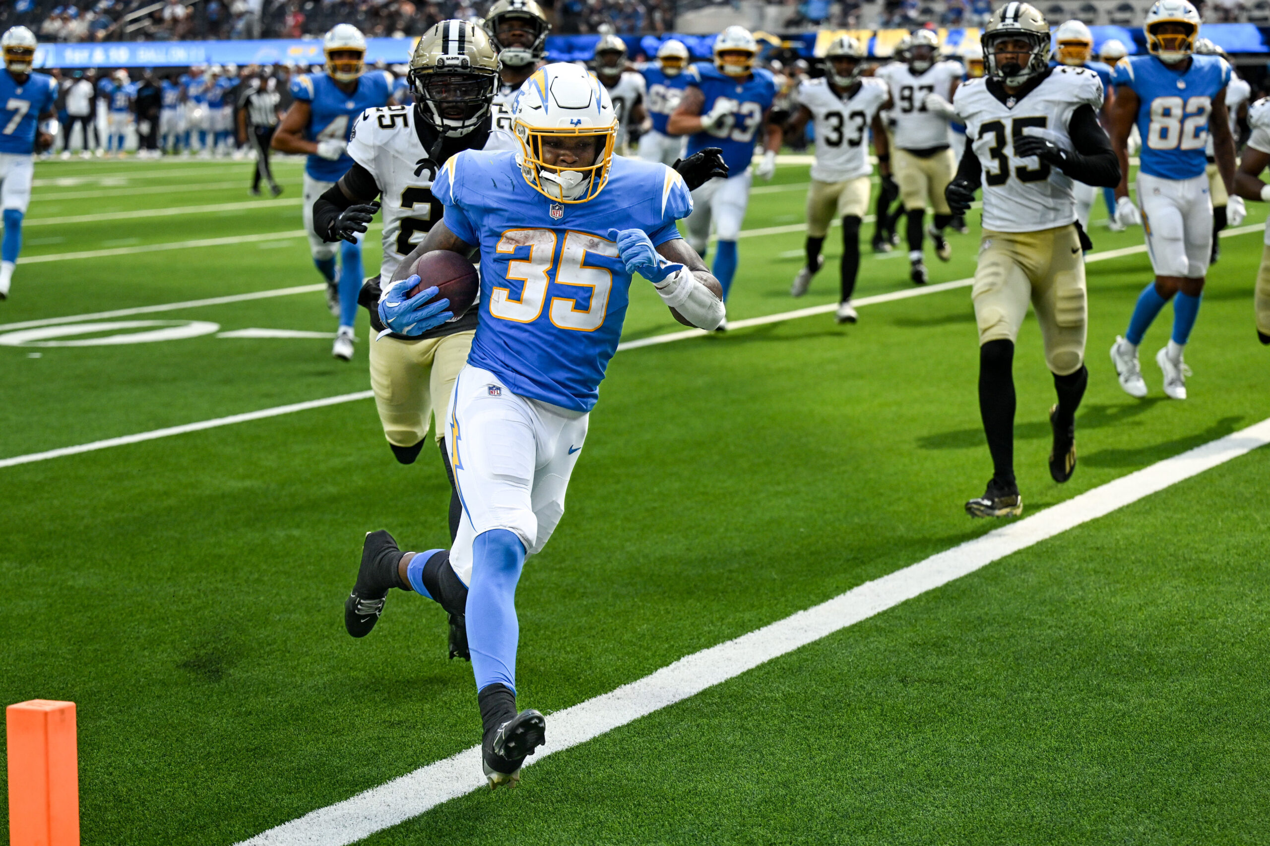 The Chargers Elliott Davison, #35, scores during fourth quarter action...
