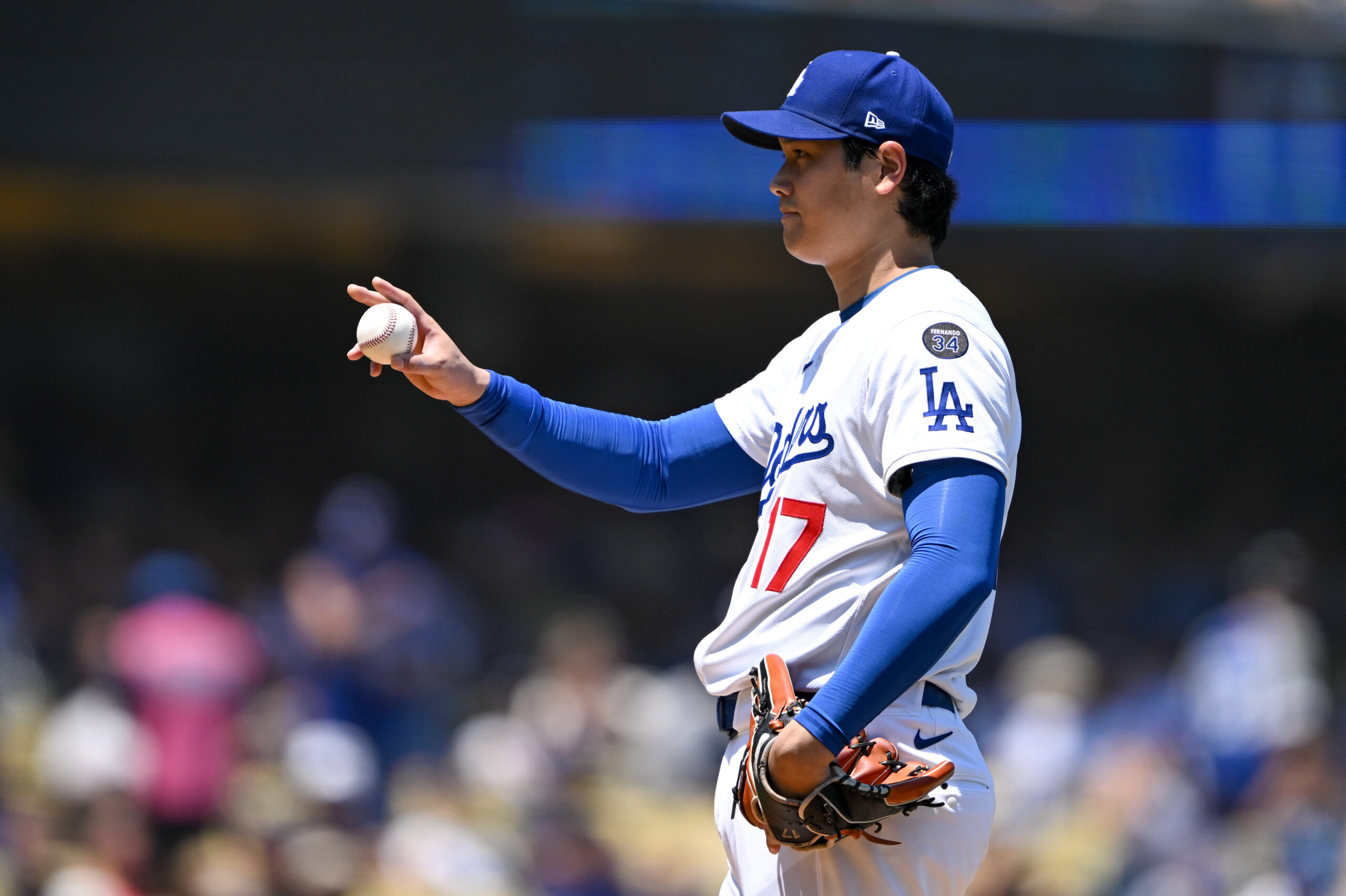 Dodgers Shohei Ohtani, #17, prepares for his first pitch against...