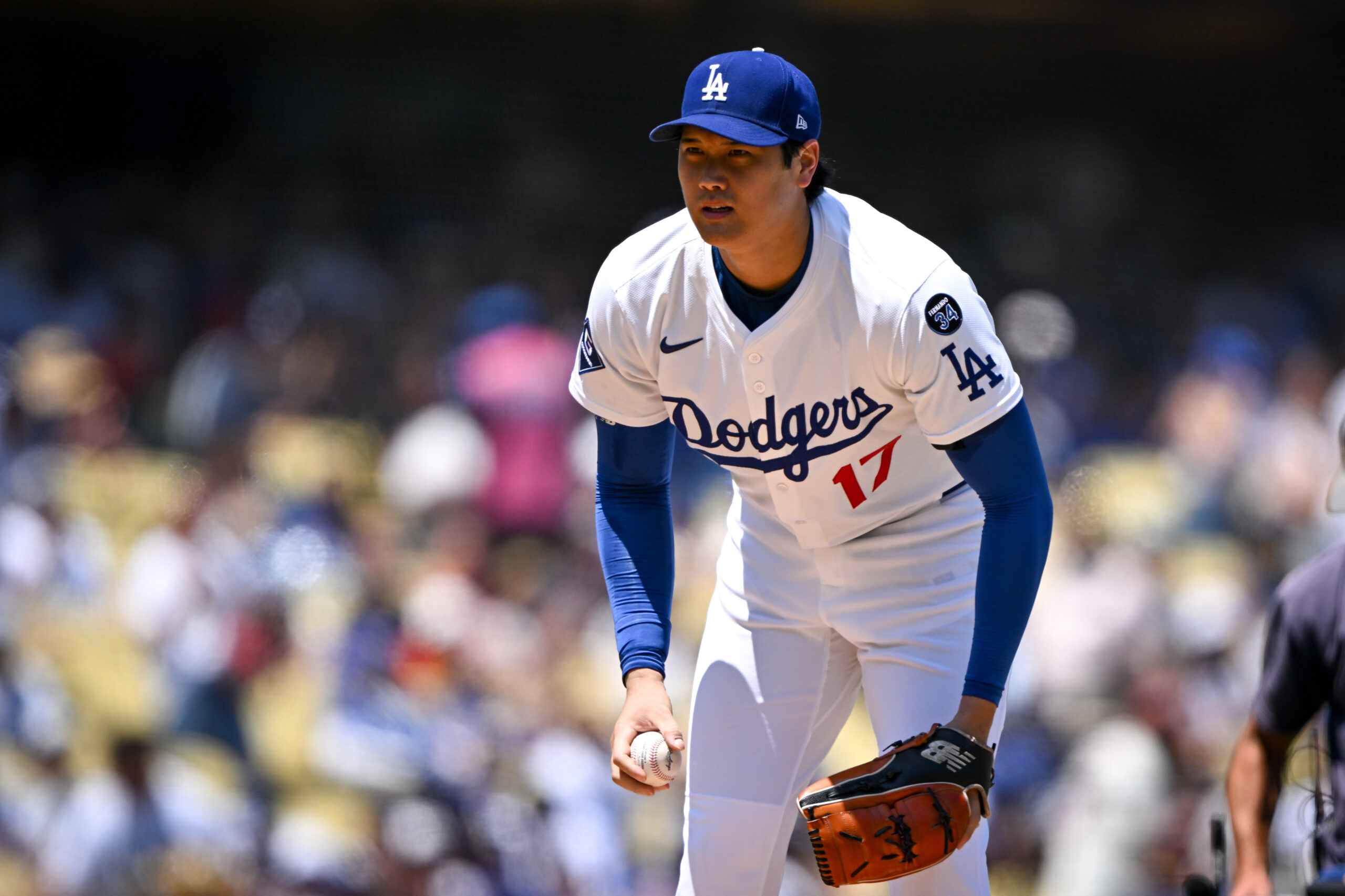 Dodgers Shohei Ohtani, #17, prepares for his first pitch against...