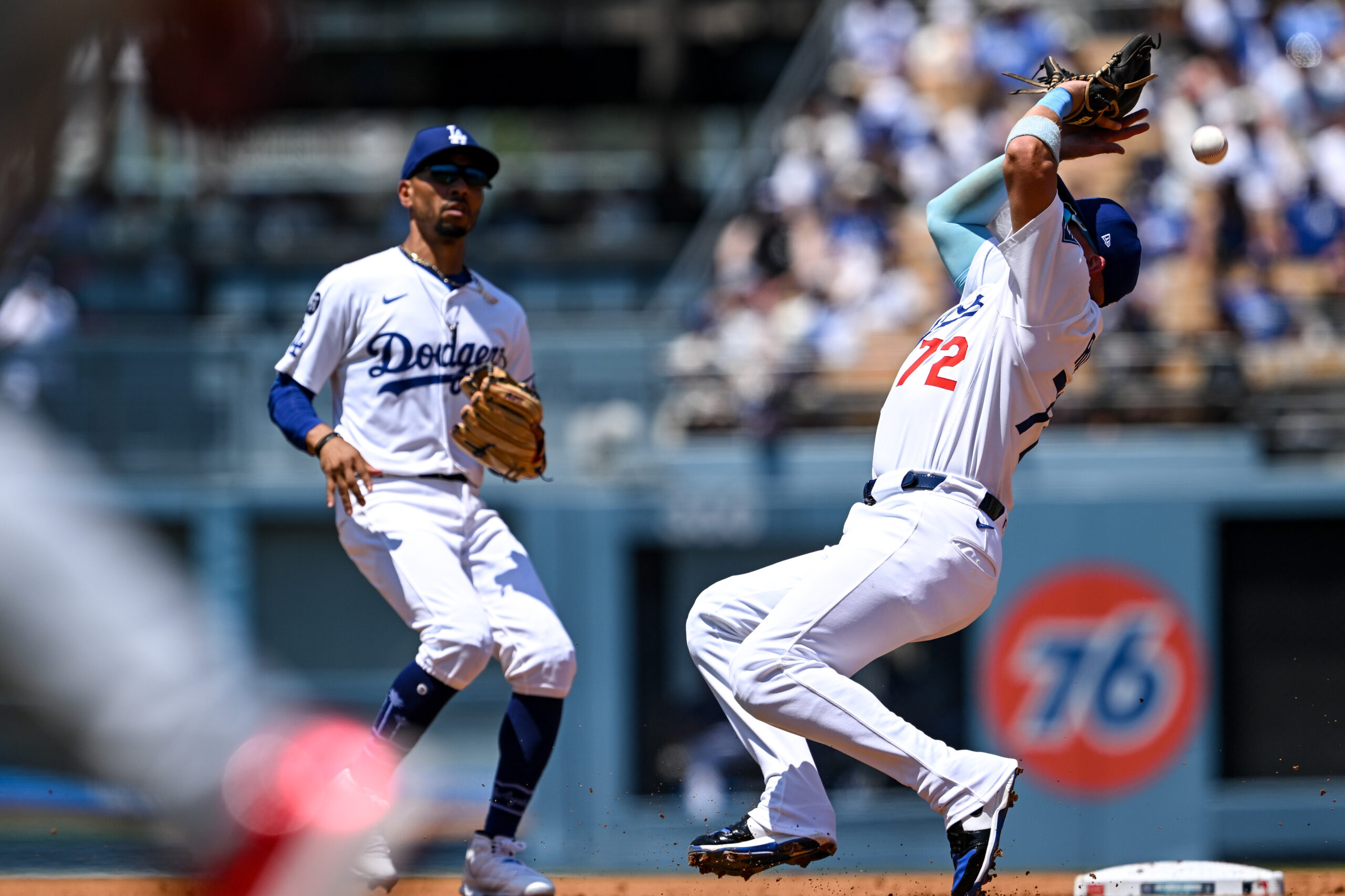 Dodgers Miguel Rojas, #72 loses this pop-up in the sun...