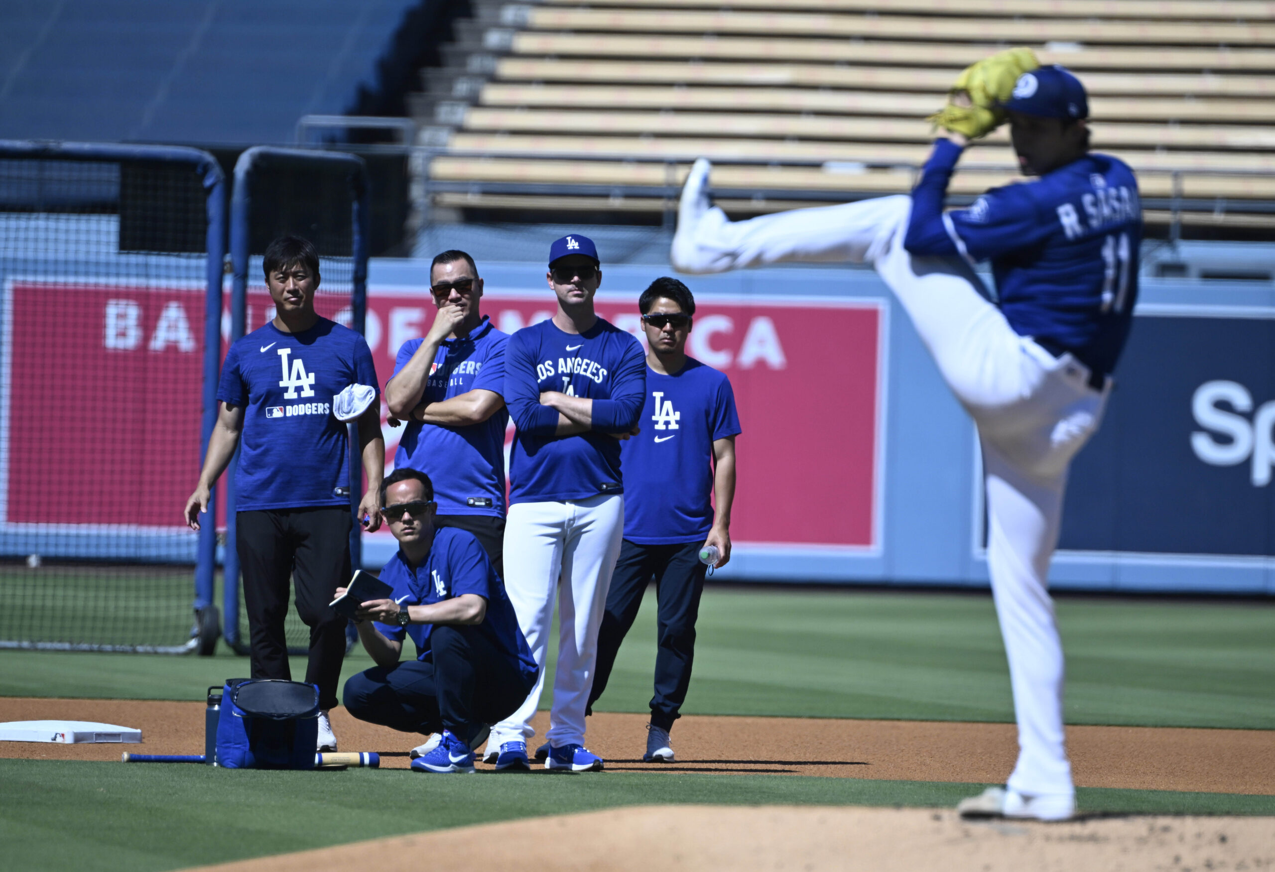 Roki Sasaki #11 of the Dodgers throws live batting practice...
