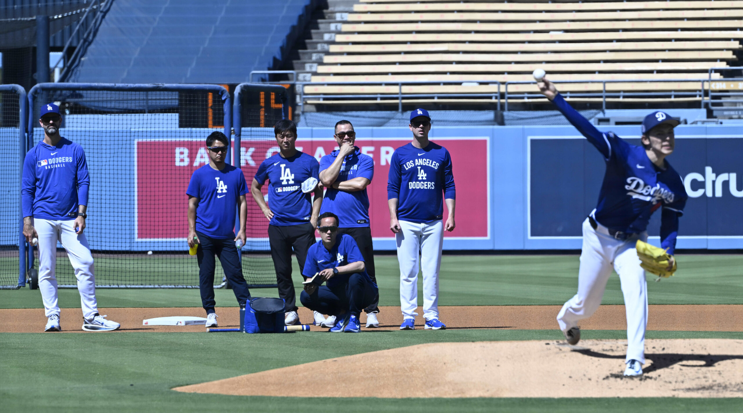 Roki Sasaki #11 of the Dodgers throws live batting practice...